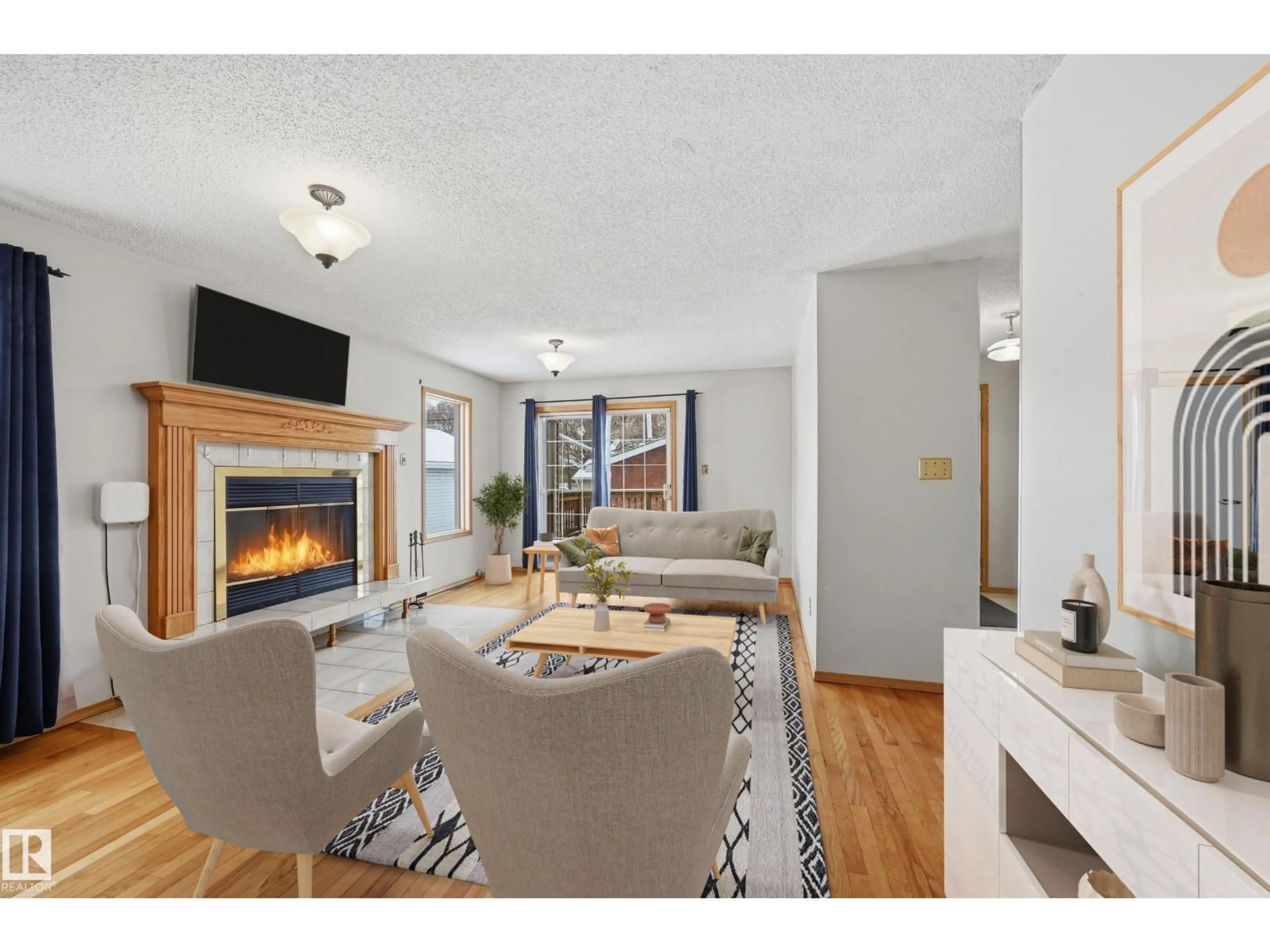 Living room with furniture, unknown for 11019 126 ST NW, Edmonton Alberta T5M0P8