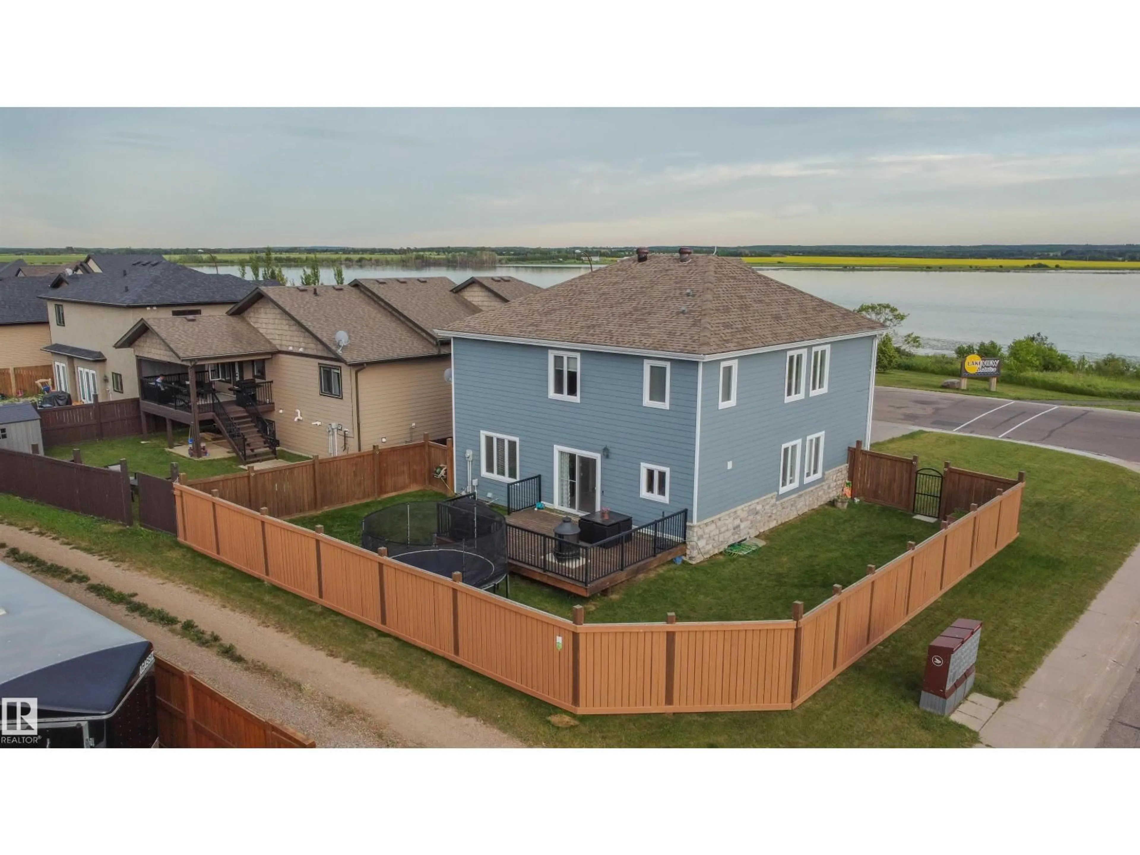 A pic from outside/outdoor area/front of a property/back of a property/a pic from drone, water/lake/river/ocean view for 3719 LAKESHORE DR, Bonnyville Town Alberta T9N0A4