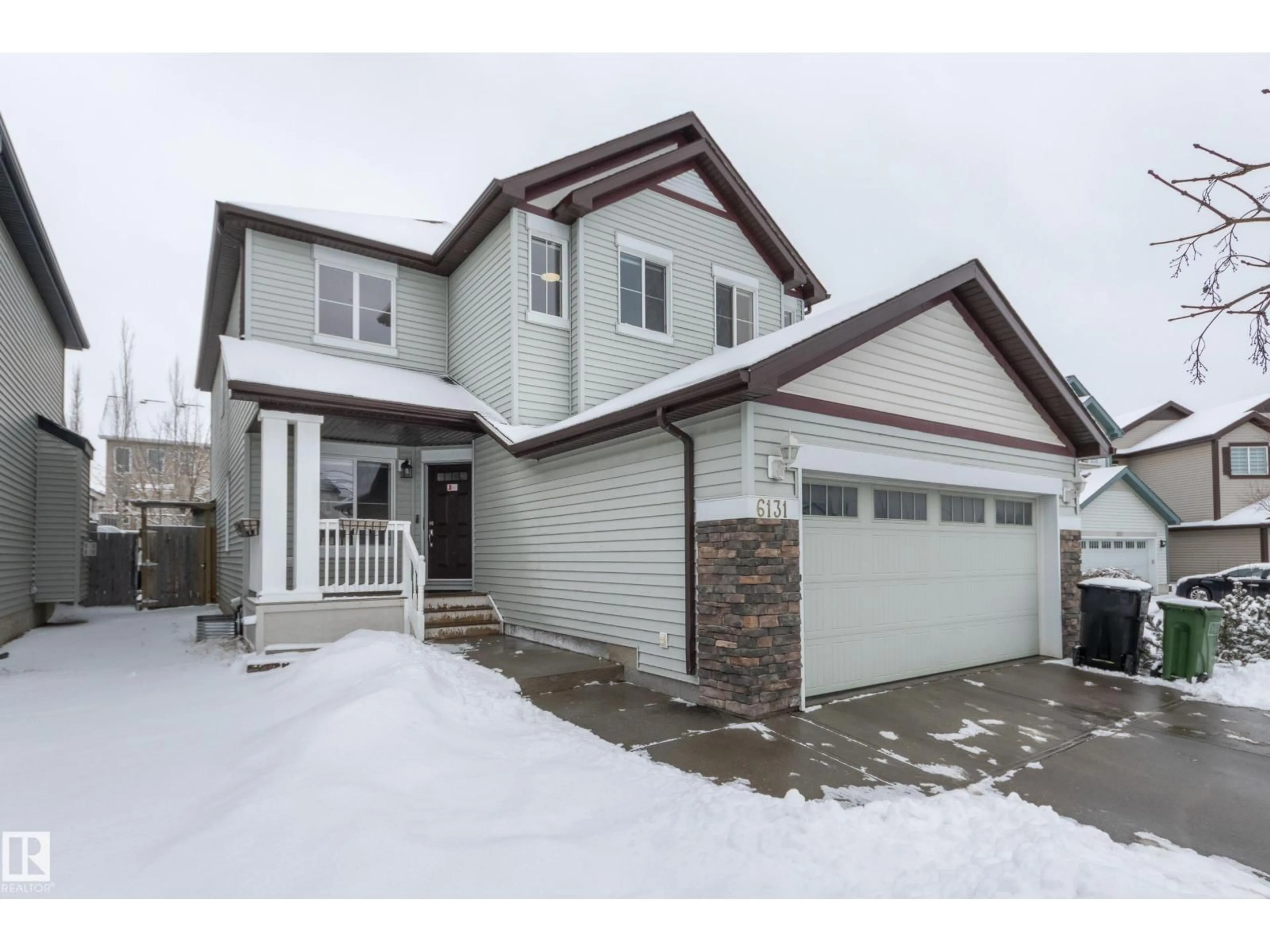 Home with vinyl exterior material, street for 6131 10 AV, Edmonton Alberta T6X0M3