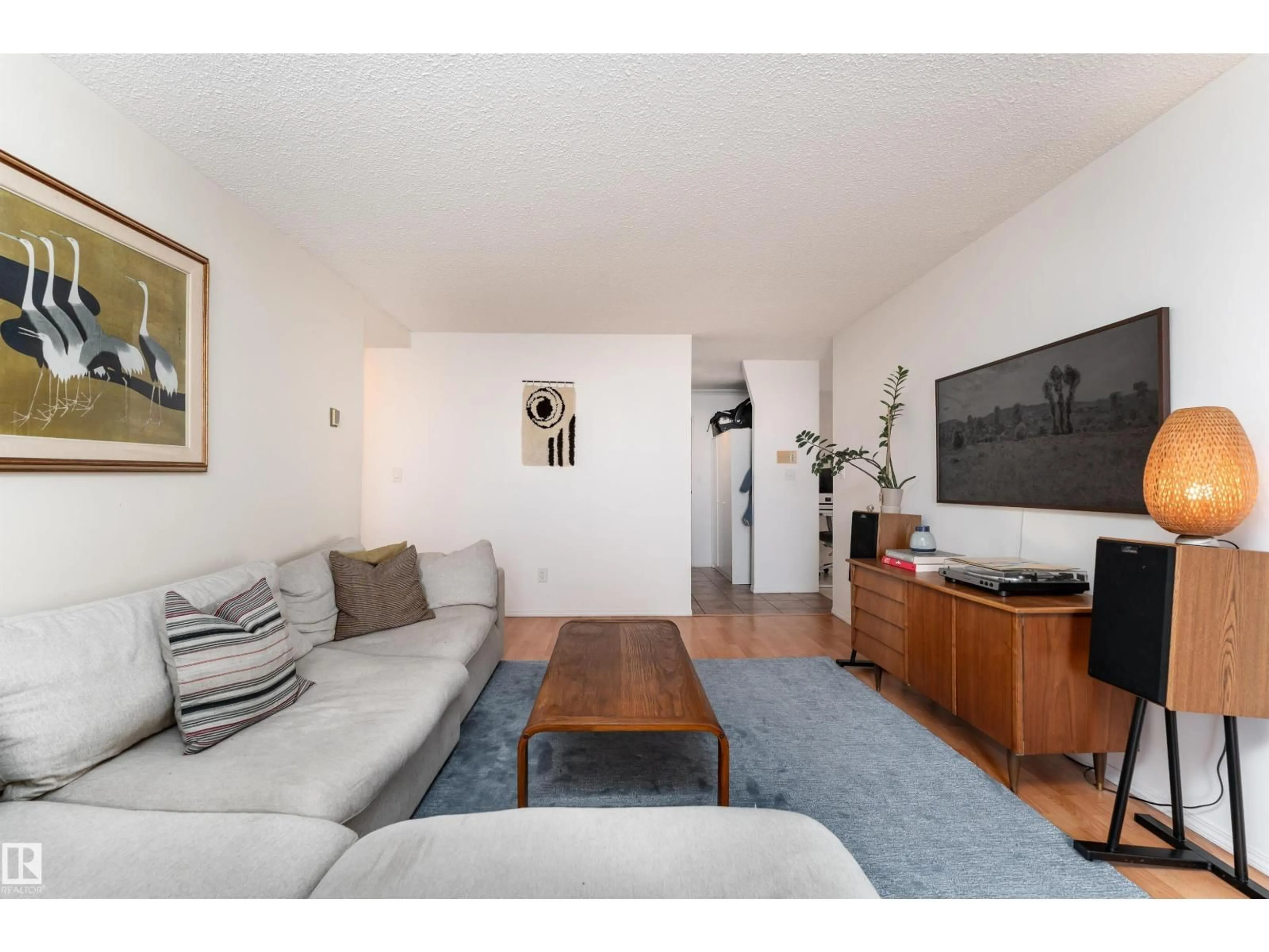 Living room with furniture, wood/laminate floor for #805 - 9808 103 ST, Edmonton Alberta T5K2G4