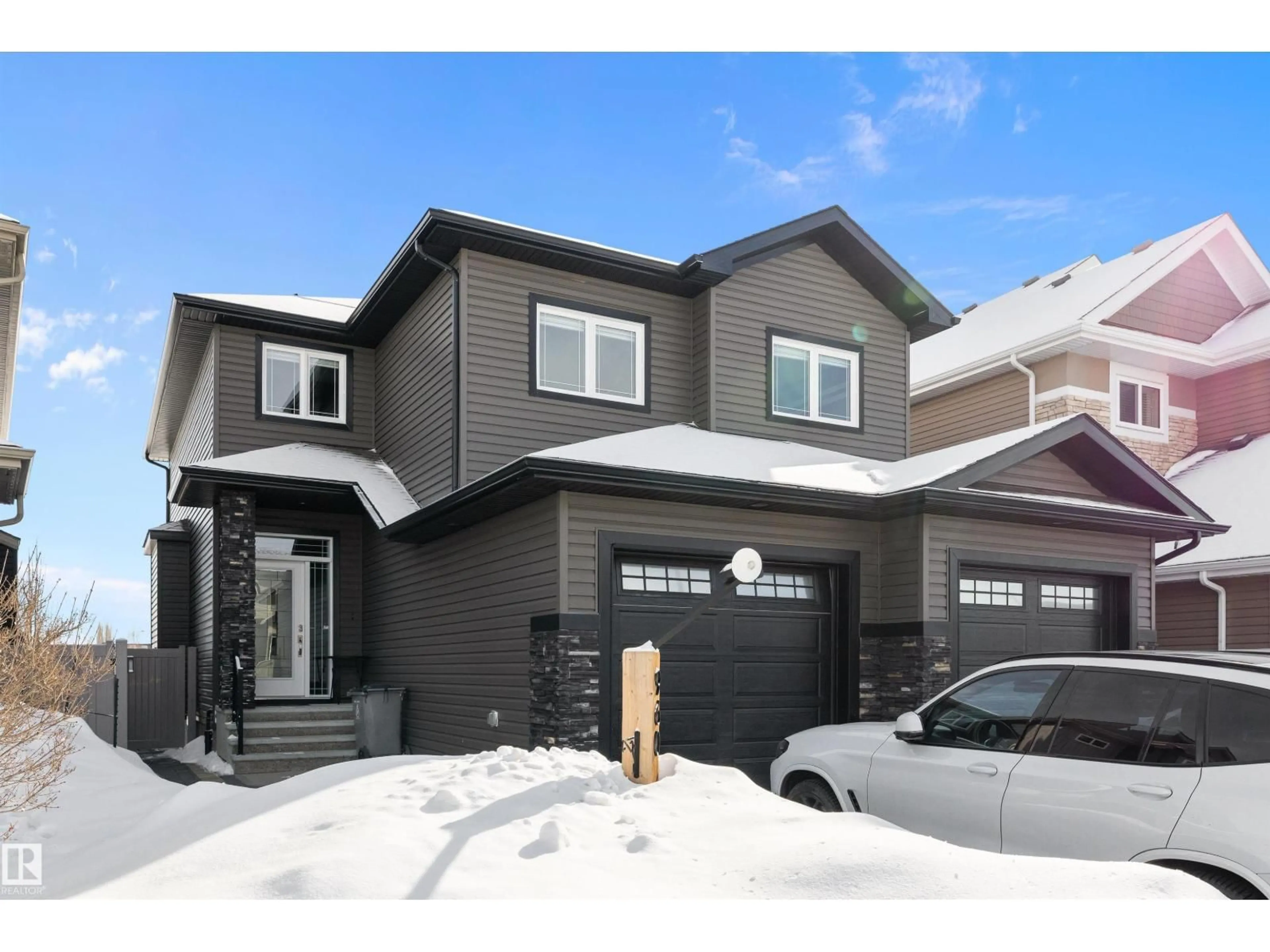 Home with vinyl exterior material, street for 9609 106 AV, Morinville Alberta T8R2N5