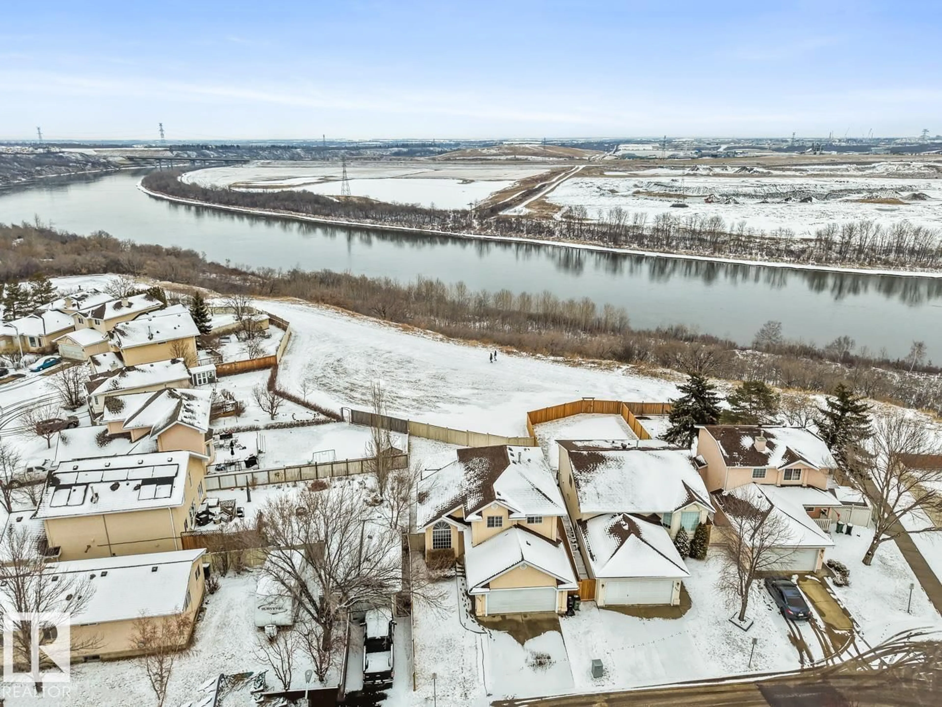 A pic from outside/outdoor area/front of a property/back of a property/a pic from drone, water/lake/river/ocean view for 235 RIVER PT, Edmonton Alberta T5A4Z2