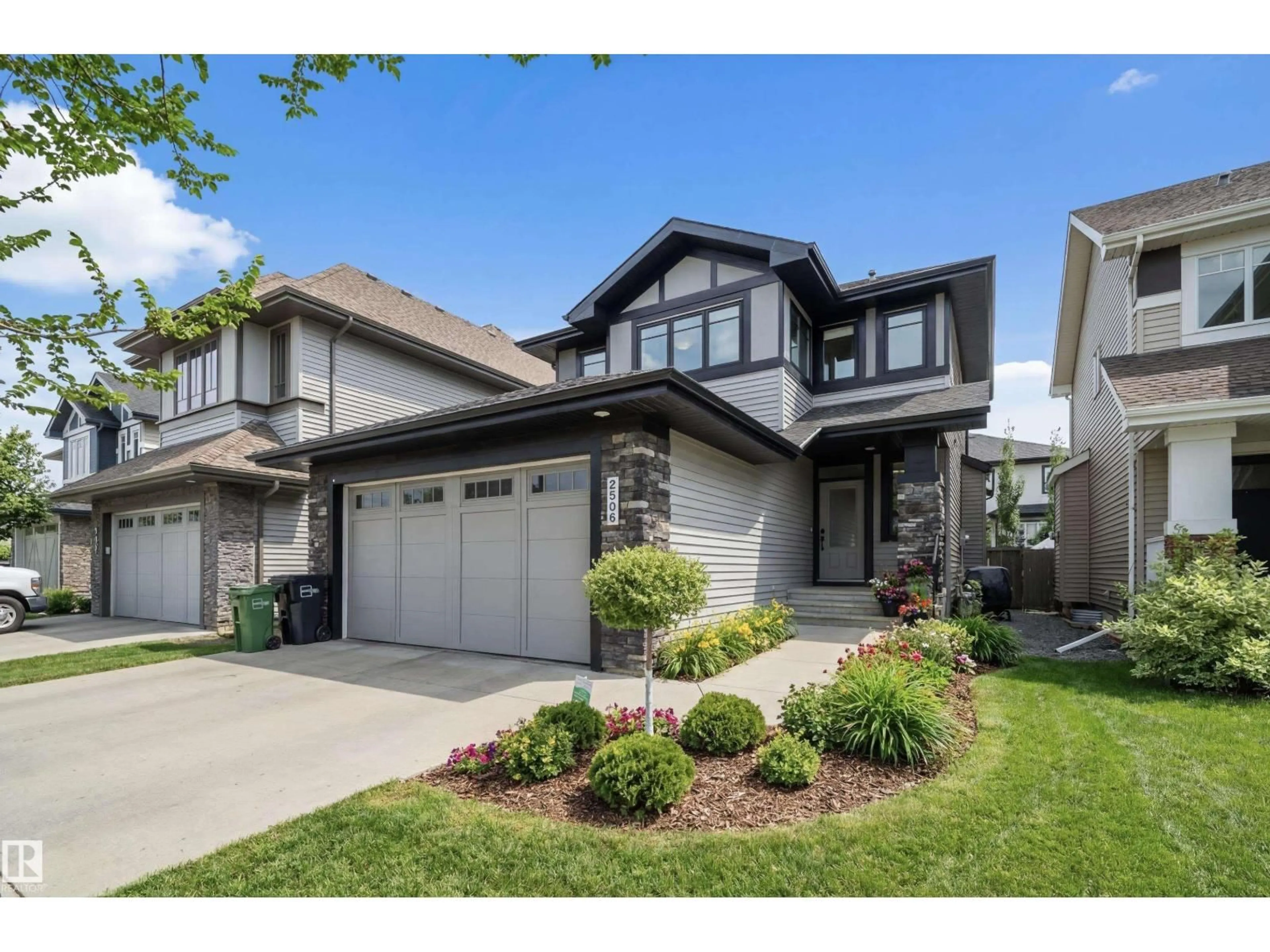 Home with vinyl exterior material, street for 2509 ANDERSON WY, Edmonton Alberta T6W0L6