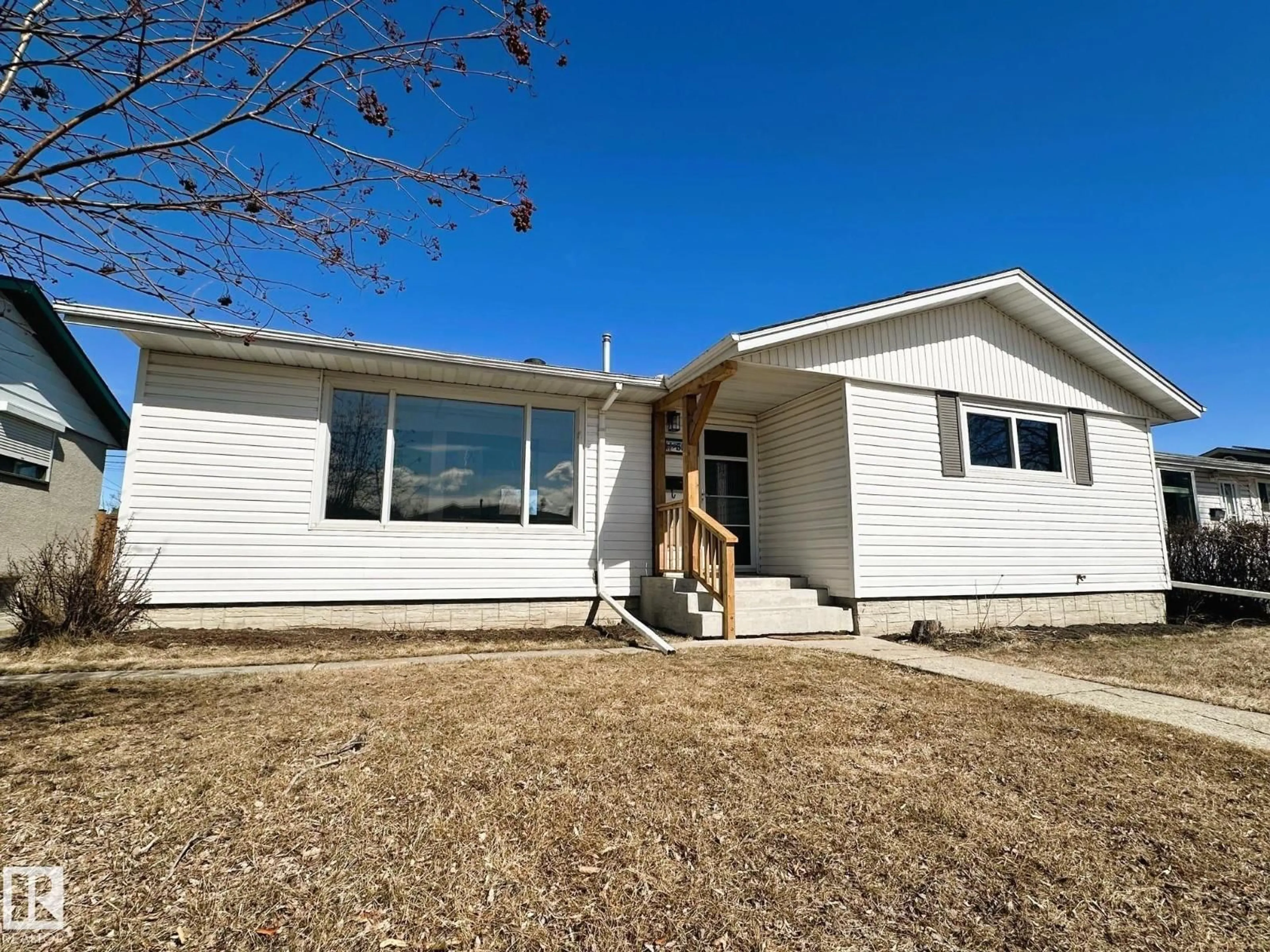 Home with vinyl exterior material, street for 5504 94A AV, Edmonton Alberta T6B0Y5