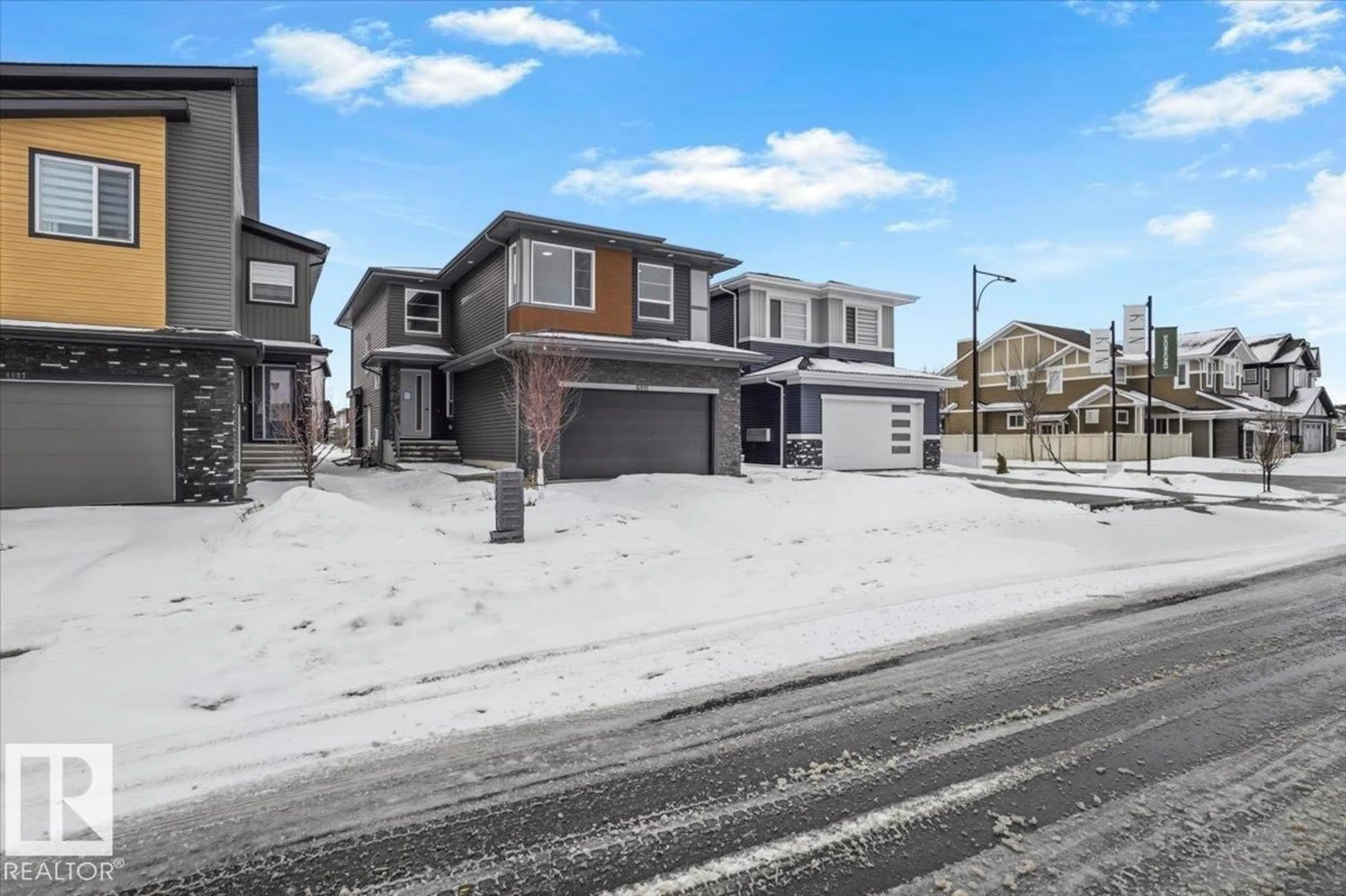 A pic from outside/outdoor area/front of a property/back of a property/a pic from drone, street for 6911 173 AV, Edmonton Alberta T5Z0W4