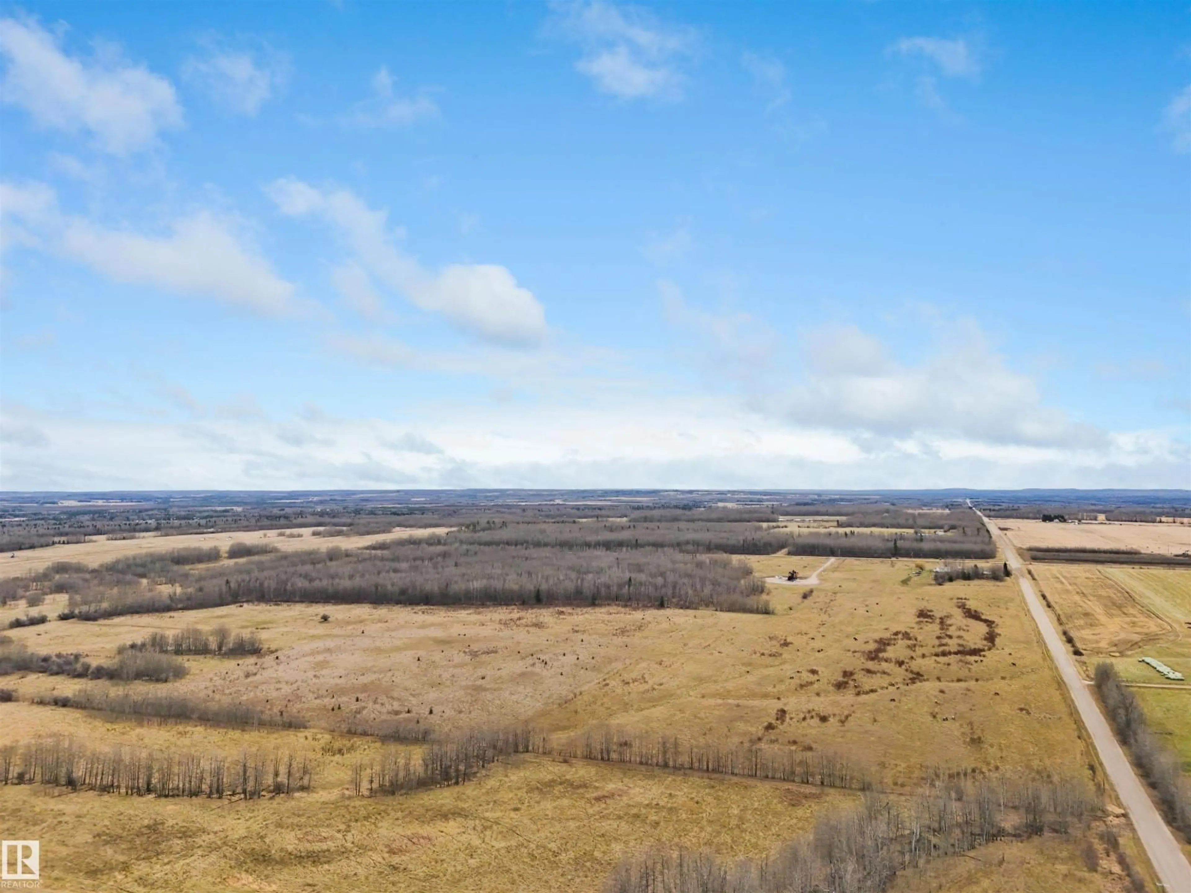 A pic from outside/outdoor area/front of a property/back of a property/a pic from drone, forest/trees view for 465005 RGE ROAD 75, Rural Wetaskiwin County Alberta T0C0A0