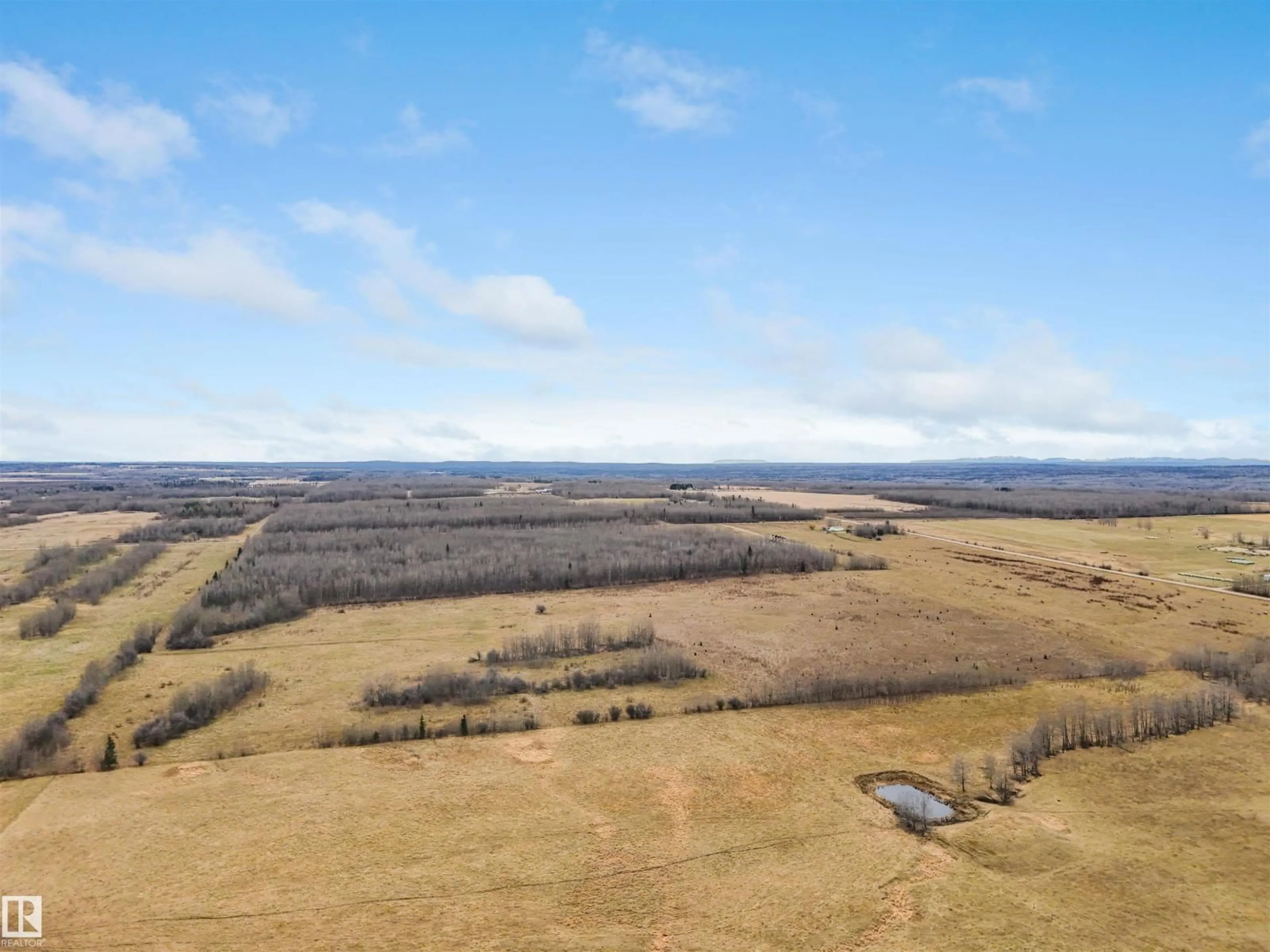 A pic from outside/outdoor area/front of a property/back of a property/a pic from drone, unknown for 465005 RGE ROAD 75, Rural Wetaskiwin County Alberta T0C0A0