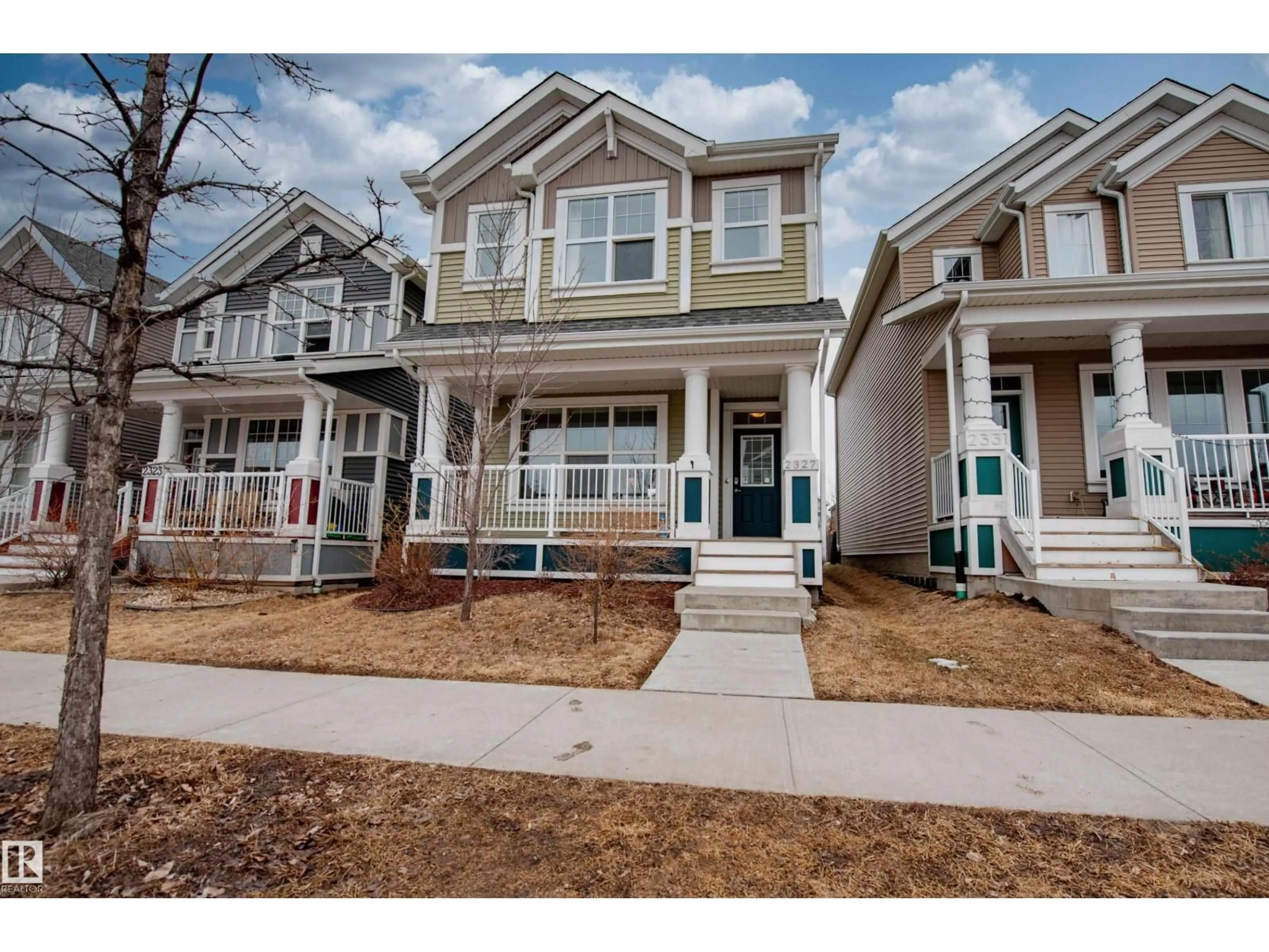 Home with vinyl exterior material, street for 2327 84 ST, Edmonton Alberta T6X1A2