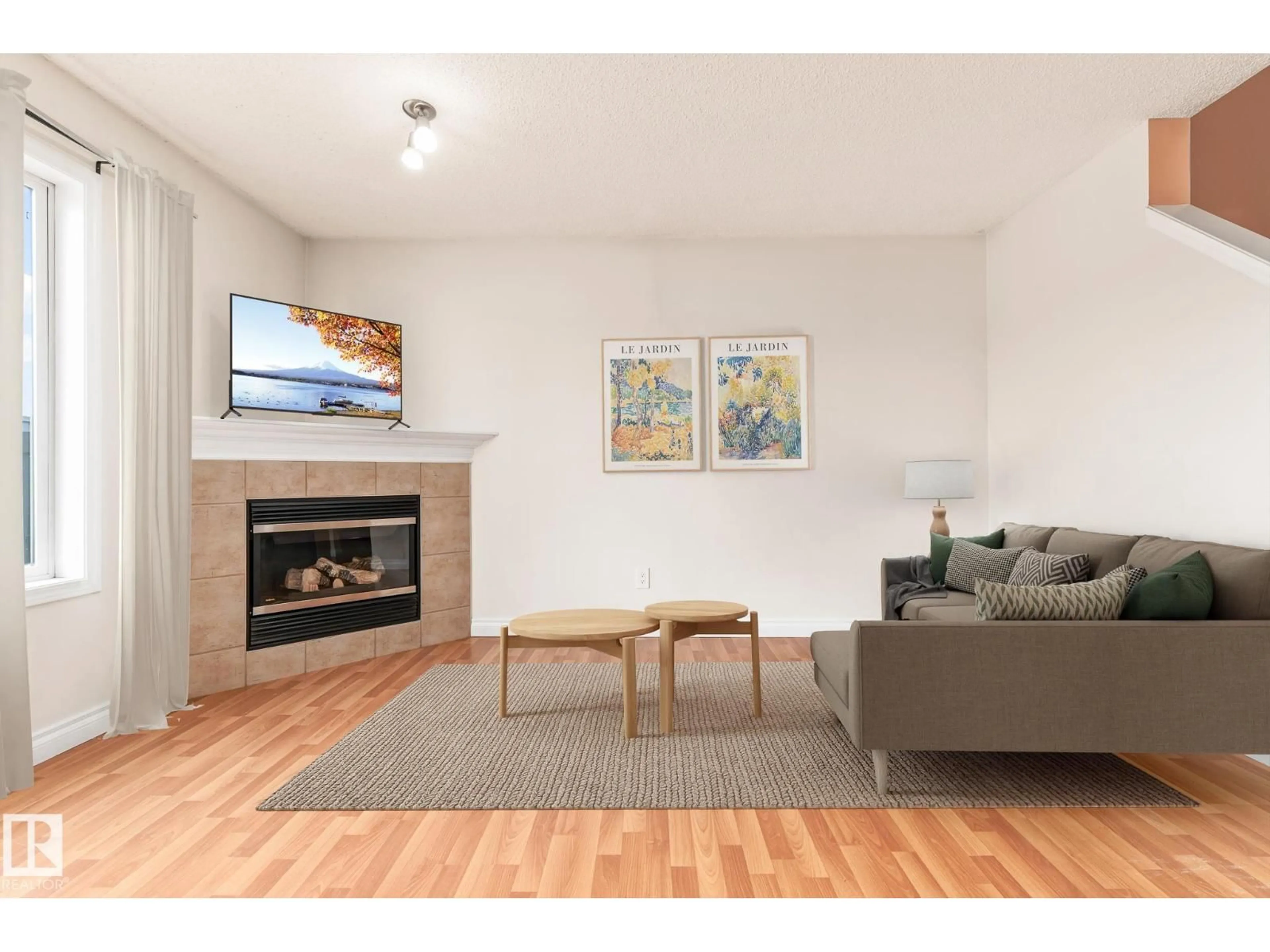 Living room with furniture, wood/laminate floor for #41 - 2021 GRANTHAM CO, Edmonton Alberta T5T6V7