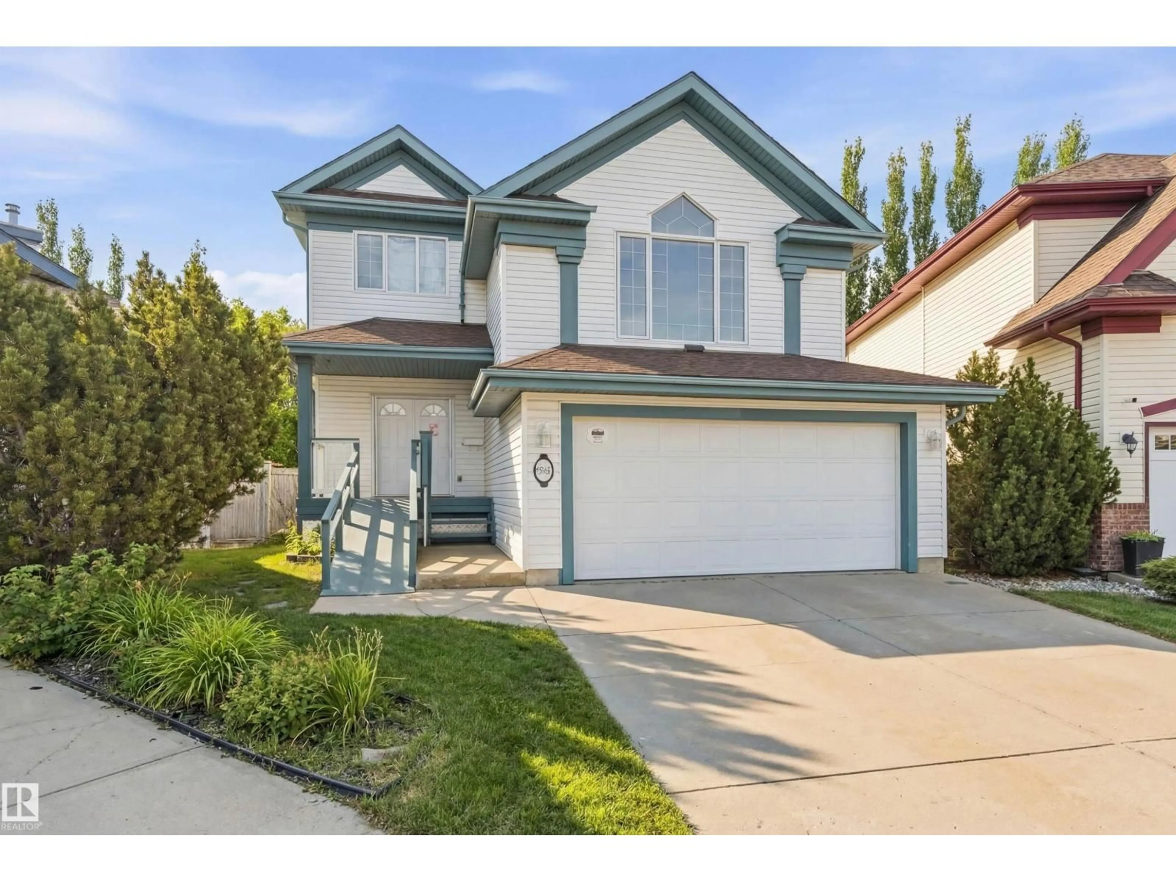 Home with vinyl exterior material, street for 582 GLENWRIGHT CR, Edmonton Alberta T5T6K8