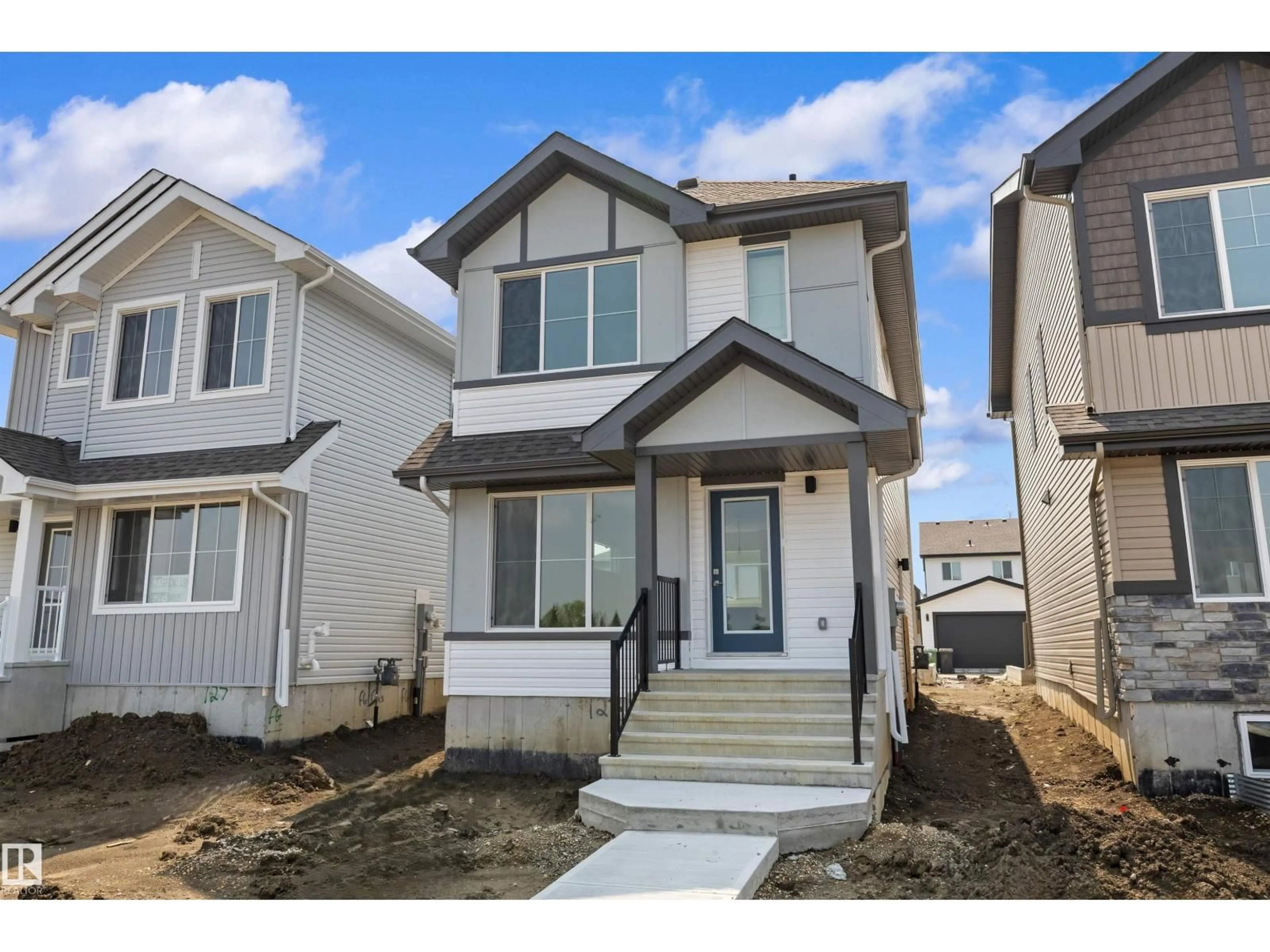Home with vinyl exterior material, street for 123 SERENO LN, Fort Saskatchewan Alberta T8L0Z9