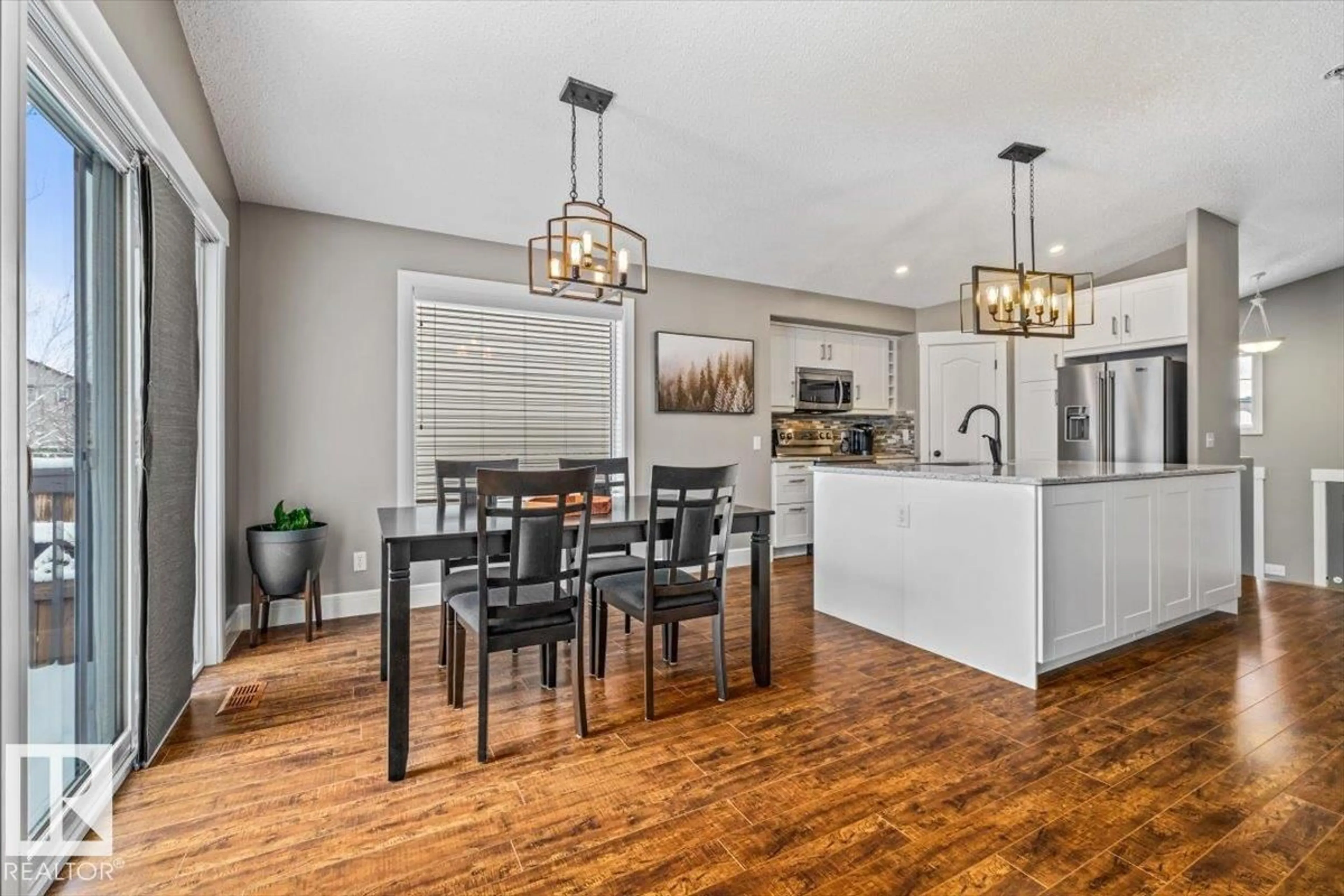 Open concept kitchen, wood/laminate floor for 8 CARLYLE CR, Sherwood Park Alberta T8H2T6