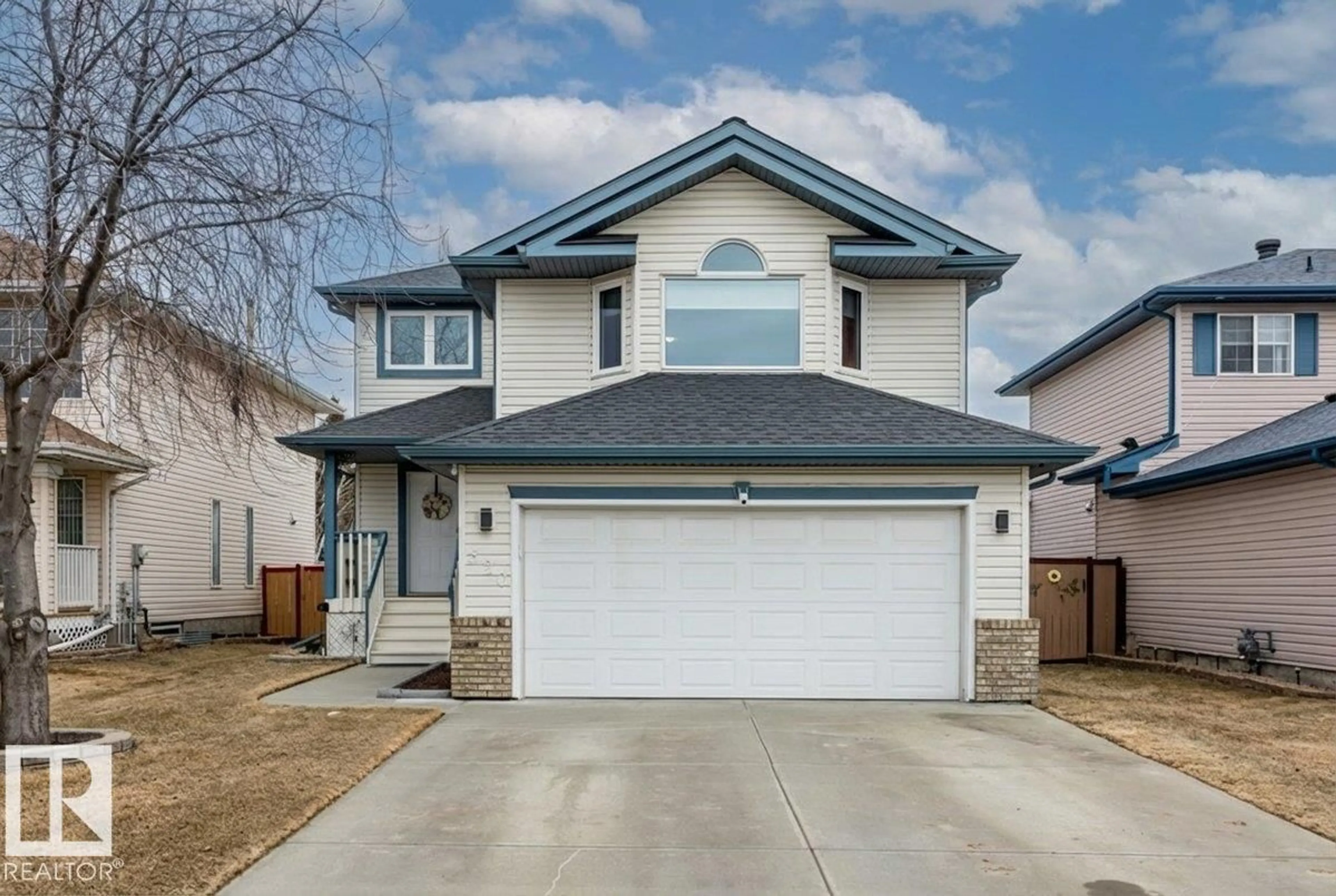 Home with vinyl exterior material, street for 520 WISEMAN LN, Edmonton Alberta T6T1N6