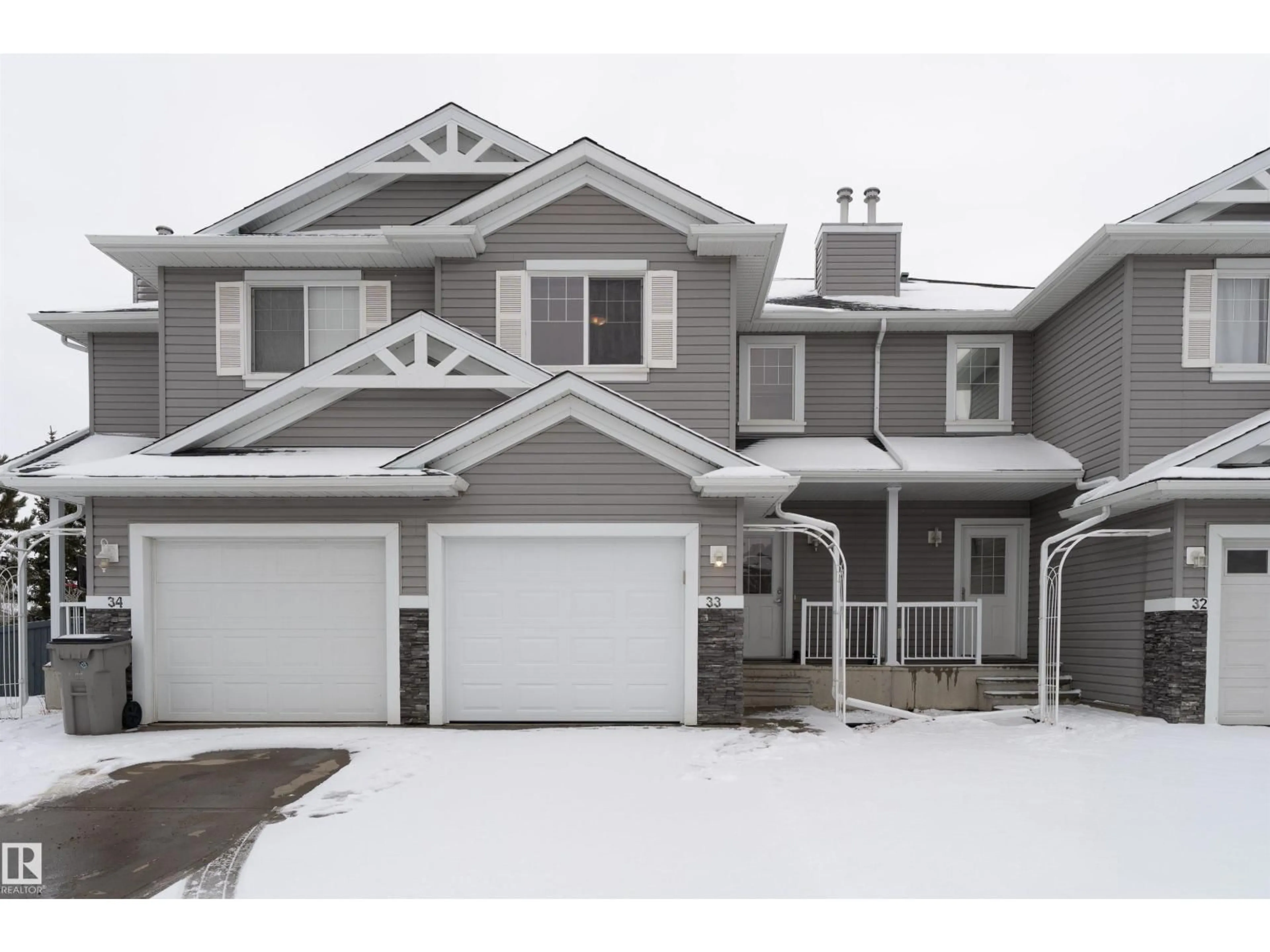 Home with vinyl exterior material, street for 33 5101 SOLEIL BV, Beaumont Alberta T4X0E3