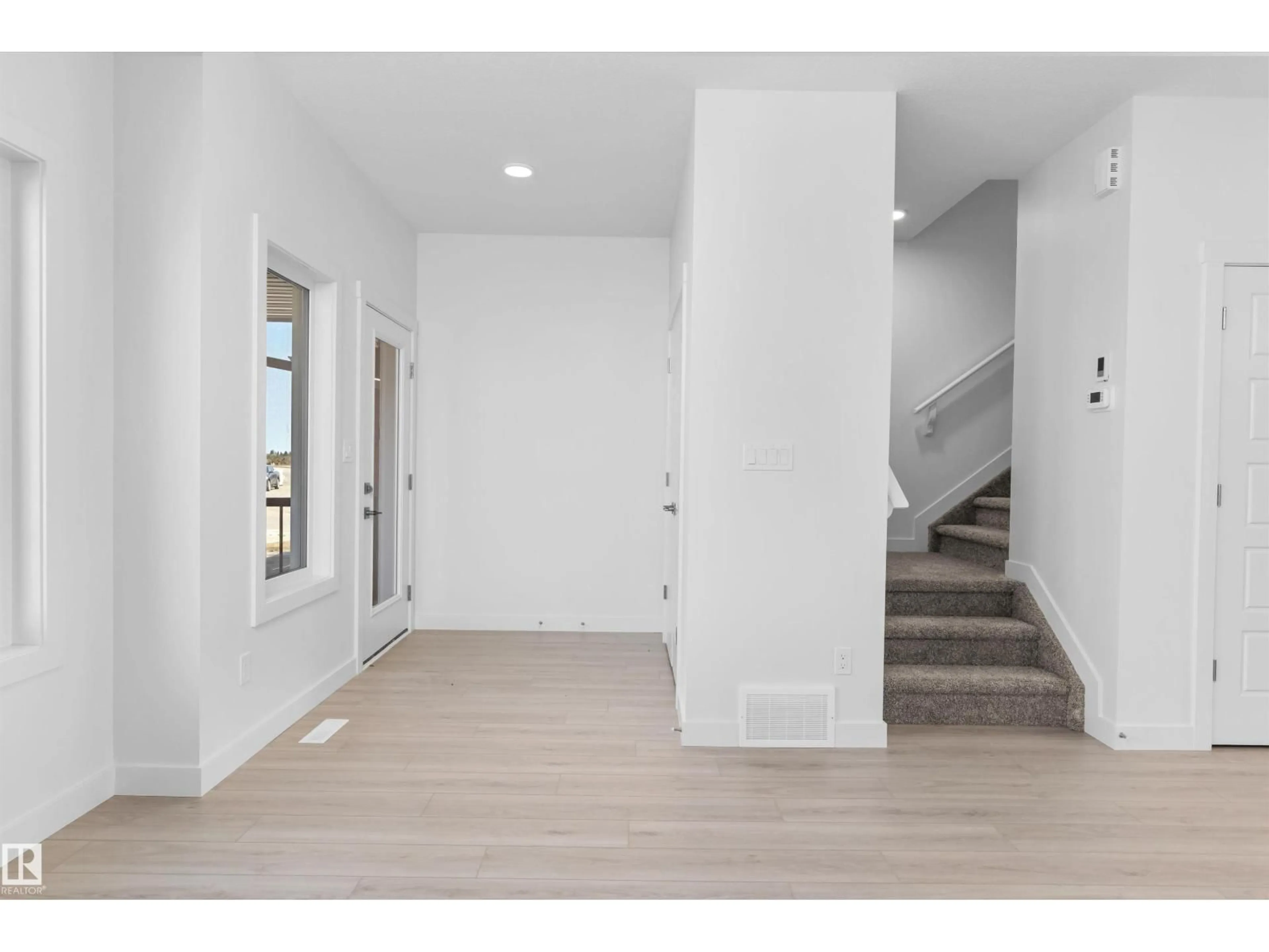 Indoor entryway for 18713 18A AV, Edmonton Alberta T6M0X8