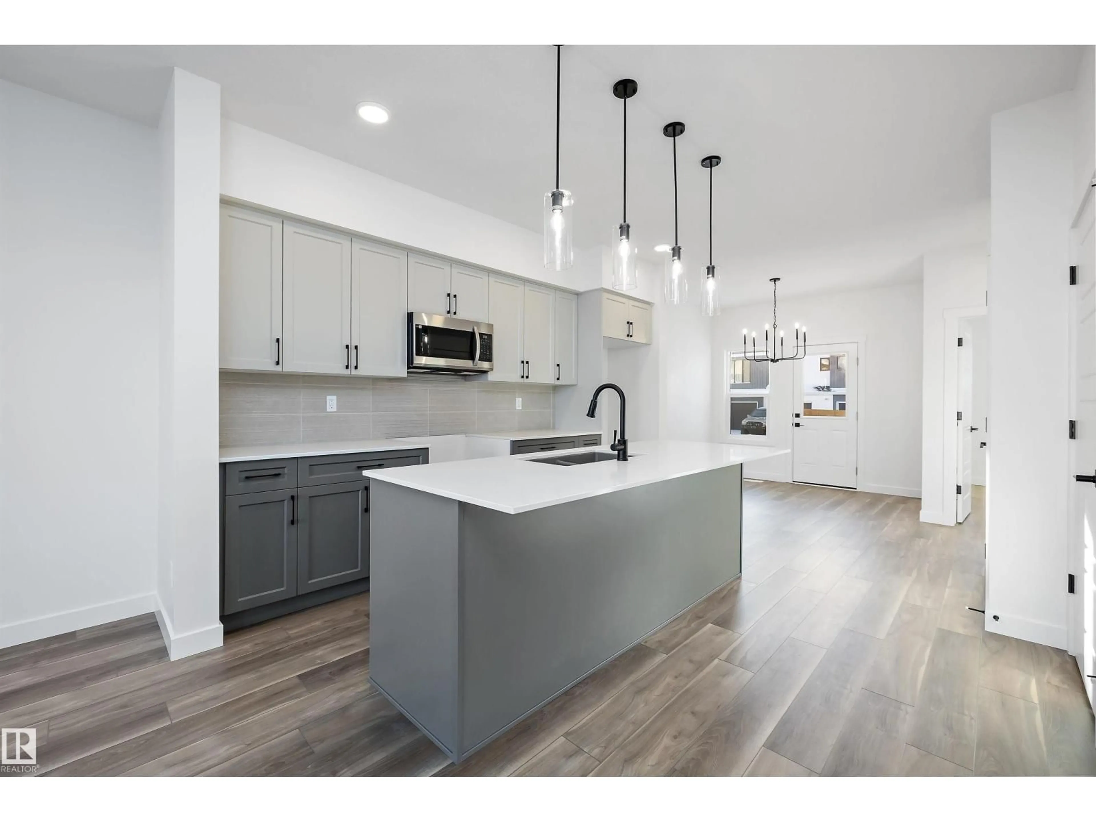 Open concept kitchen, unknown for 18713 18A AV, Edmonton Alberta T6M0X8