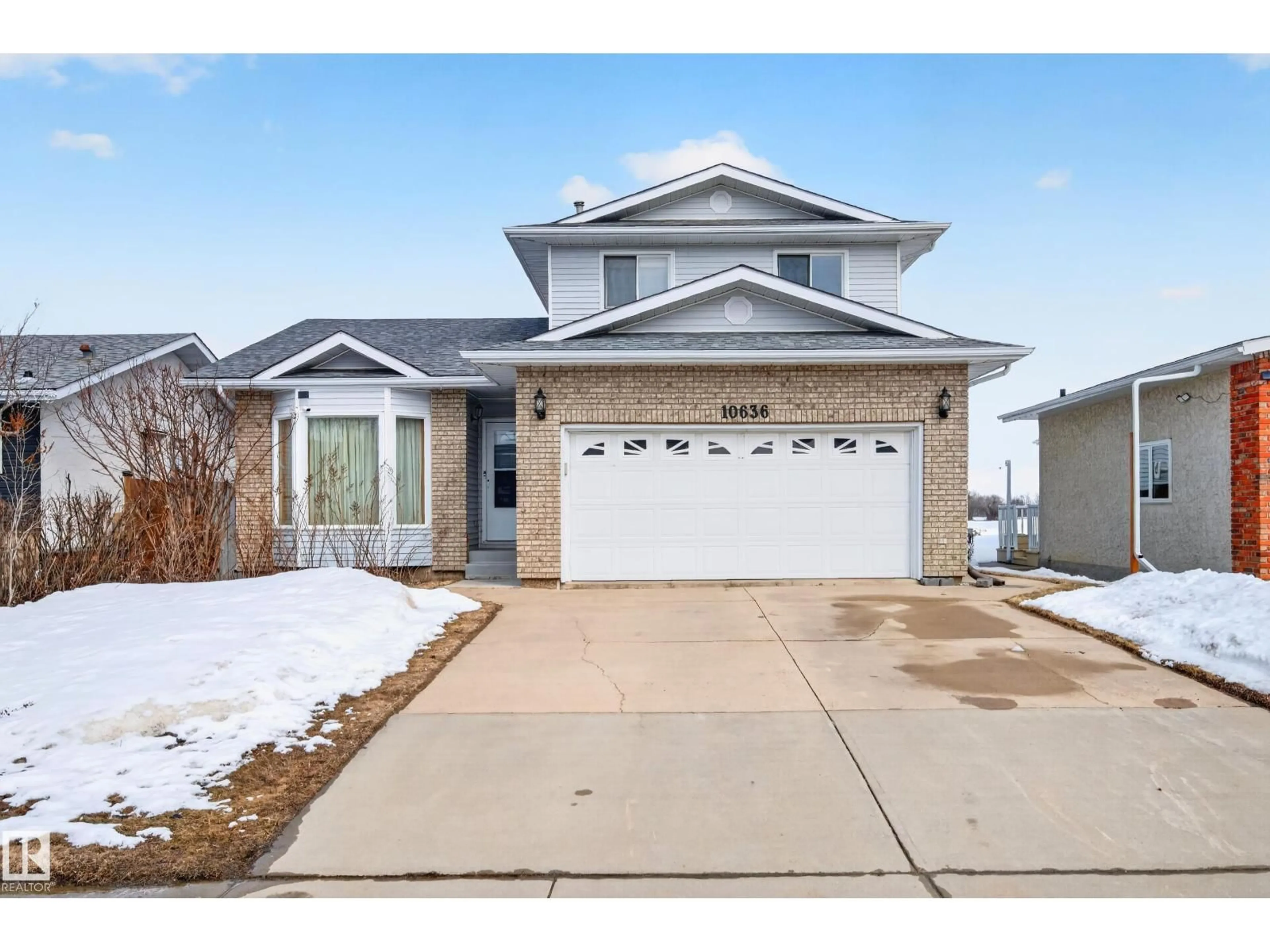 Home with vinyl exterior material, street for 10636 110 ST, Westlock Alberta T7P1A2