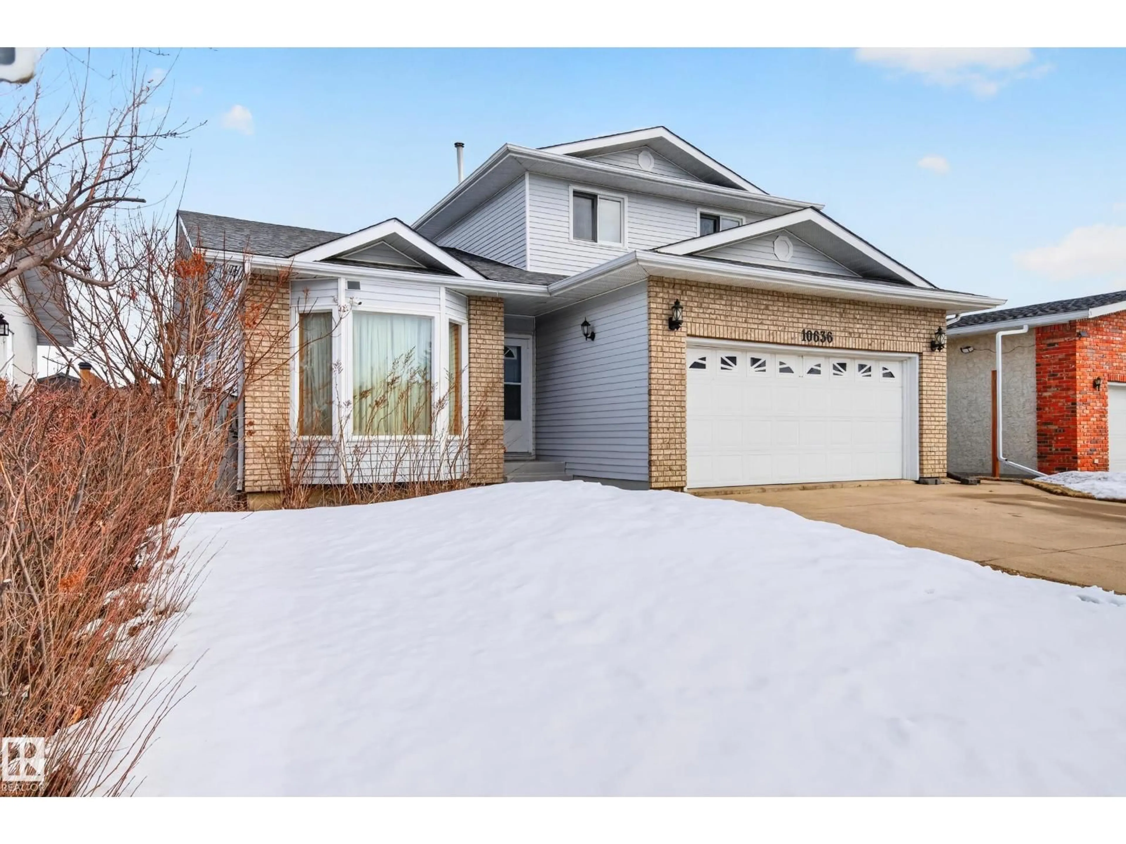 Home with vinyl exterior material, street for 10636 110 ST, Westlock Alberta T7P1A2