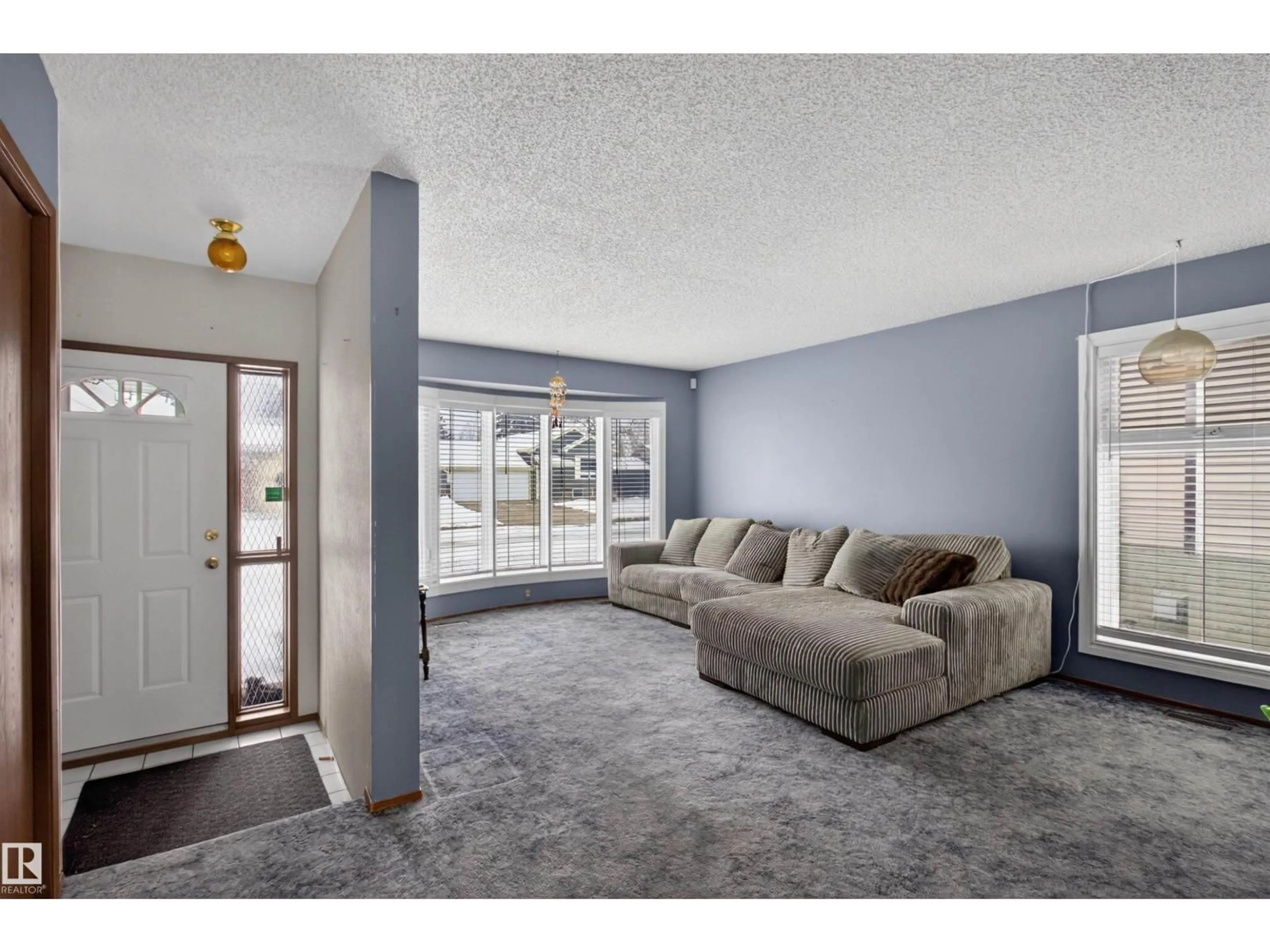 Living room with furniture, unknown for 19 HOWSON CR, Edmonton Alberta T5A4T7