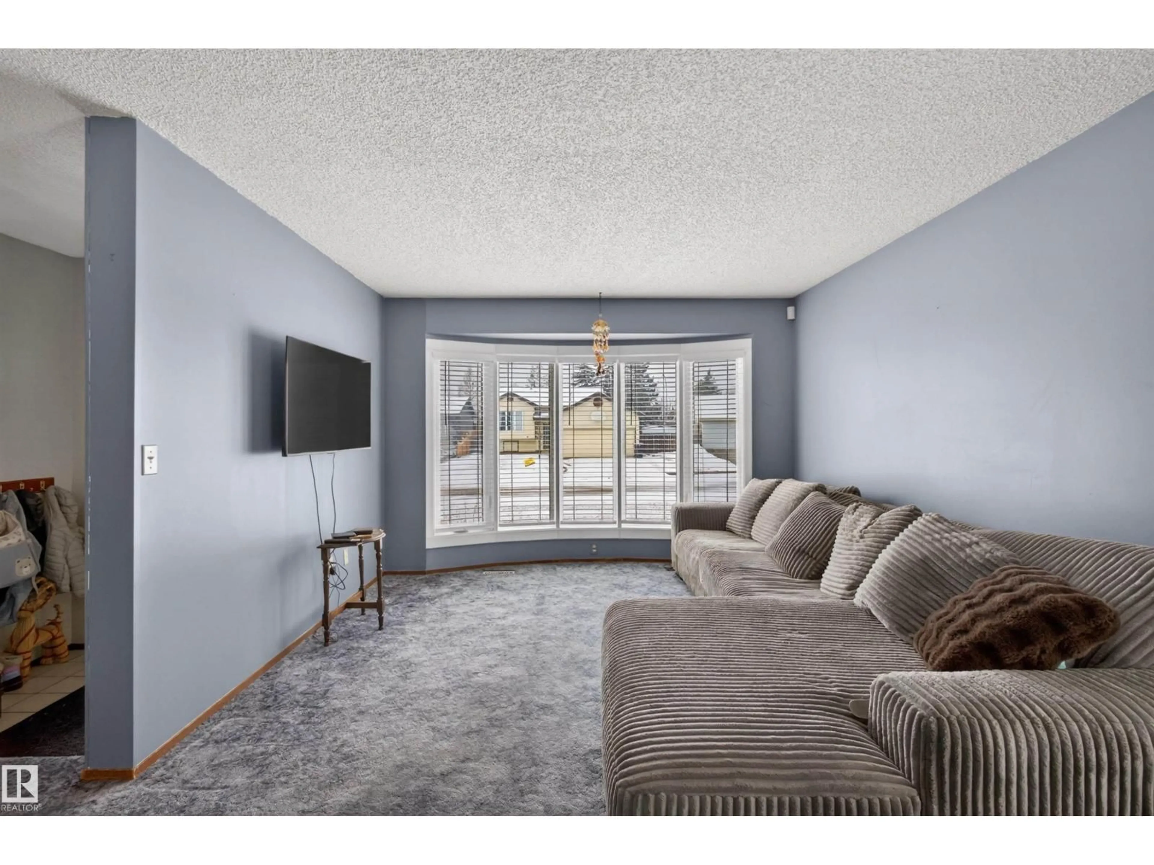 Living room with furniture, unknown for 19 HOWSON CR, Edmonton Alberta T5A4T7