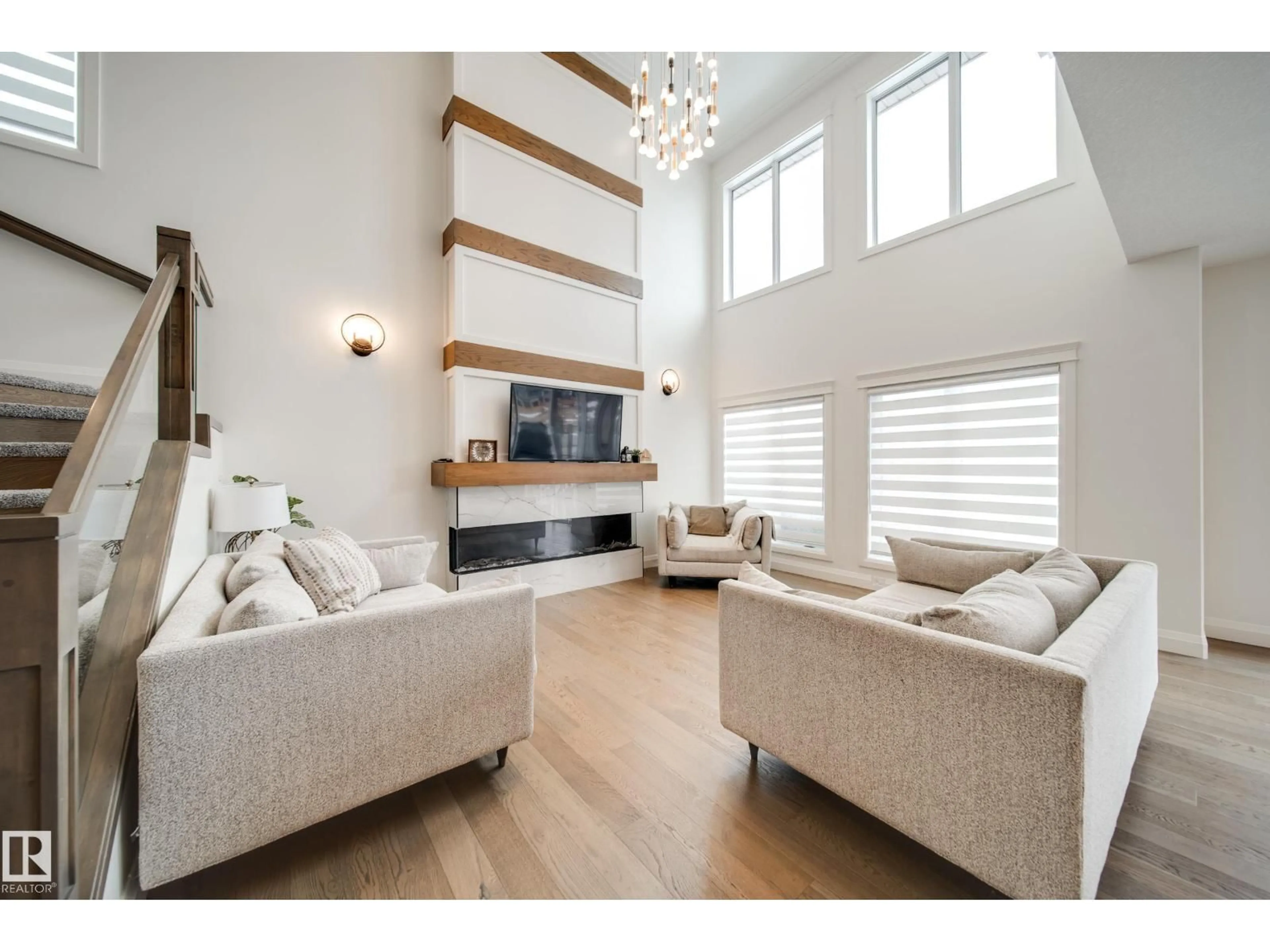 Living room with furniture, wood/laminate floor for 35 ELWYCK GA, Spruce Grove Alberta T7X3M1