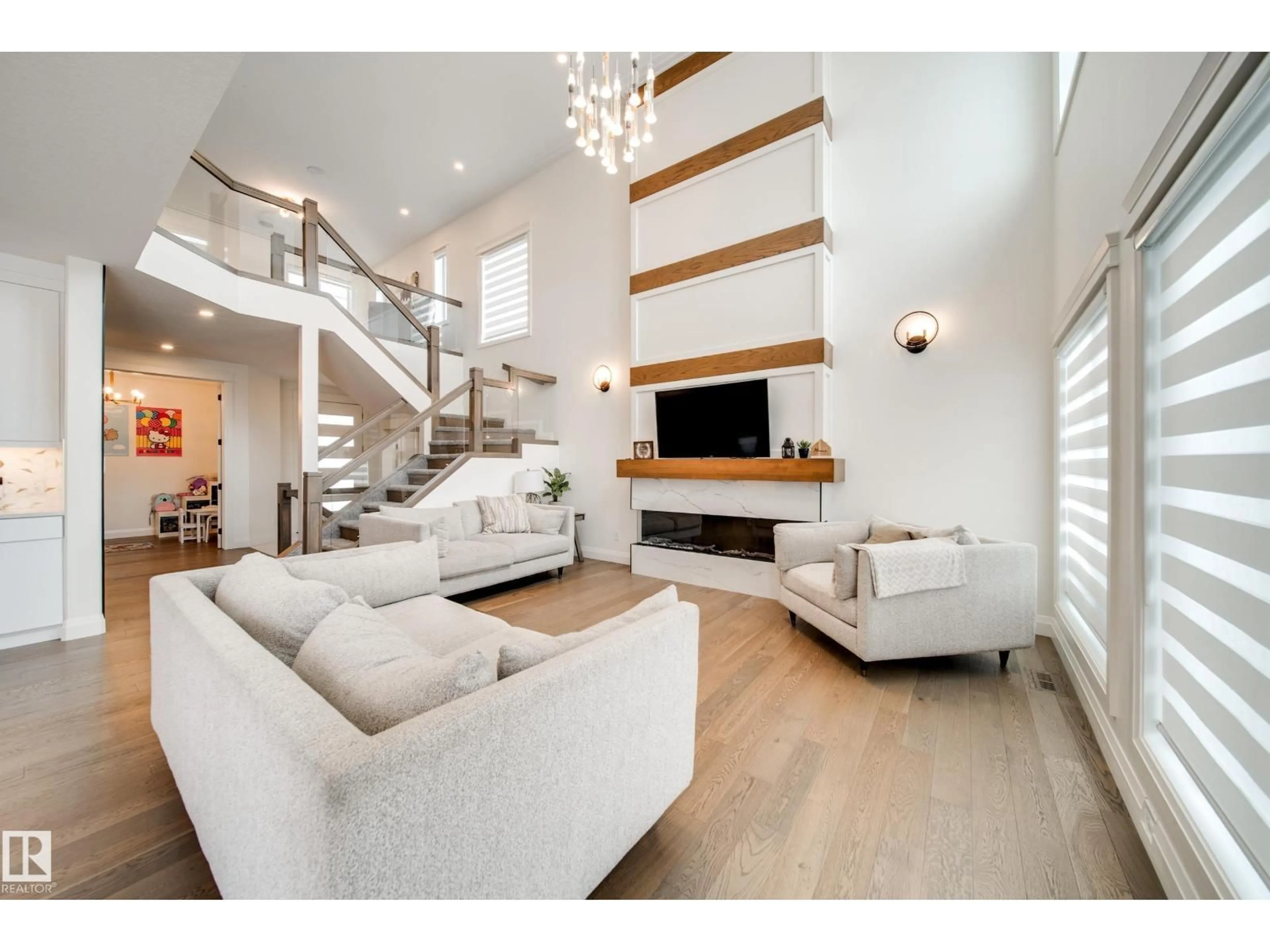 Living room with furniture, wood/laminate floor for 35 ELWYCK GA, Spruce Grove Alberta T7X3M1