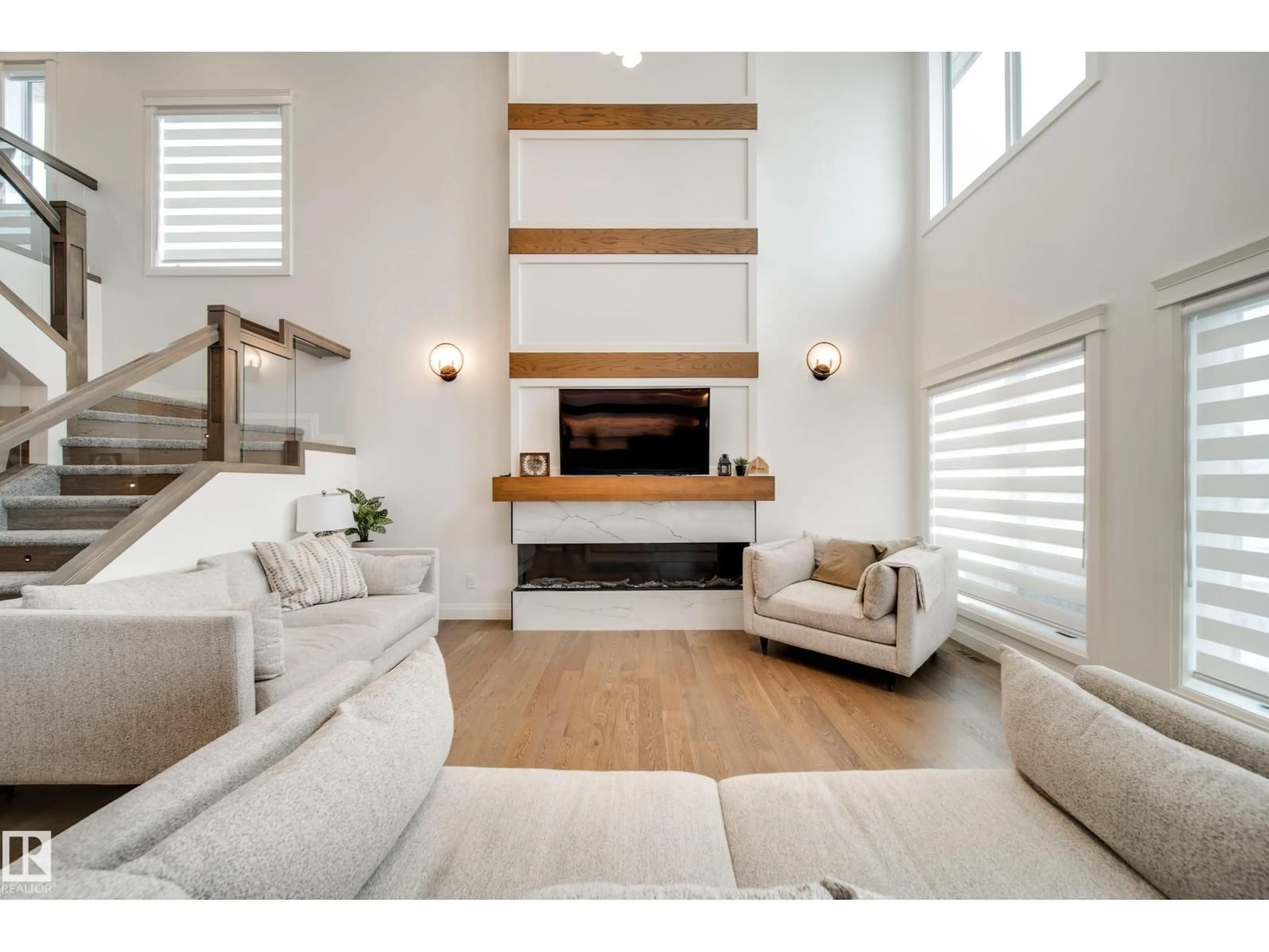 Living room with furniture, wood/laminate floor for 35 ELWYCK GA, Spruce Grove Alberta T7X3M1