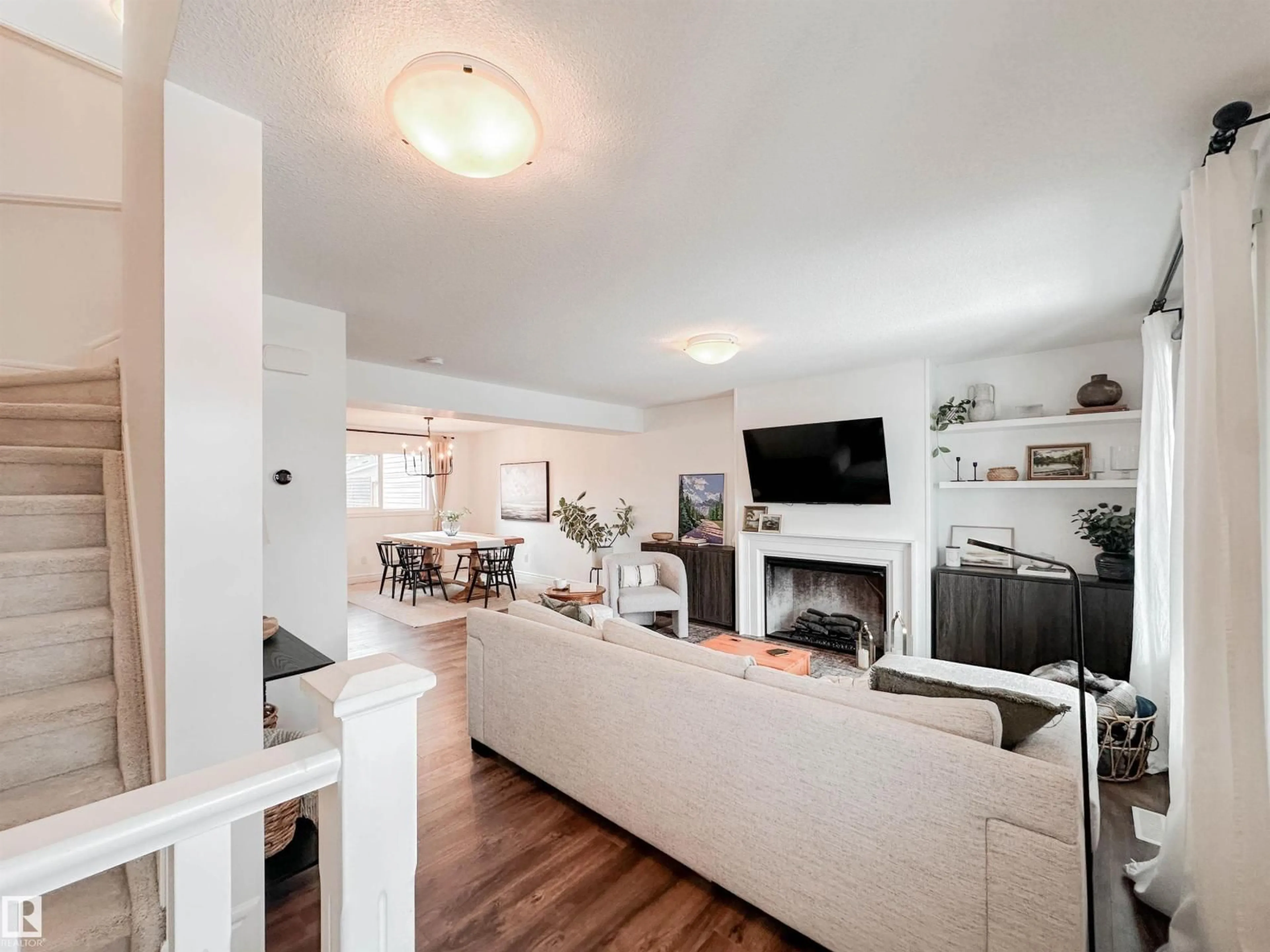 Living room with furniture, unknown for 6860 EVANS WD, Edmonton Alberta T6M0T6