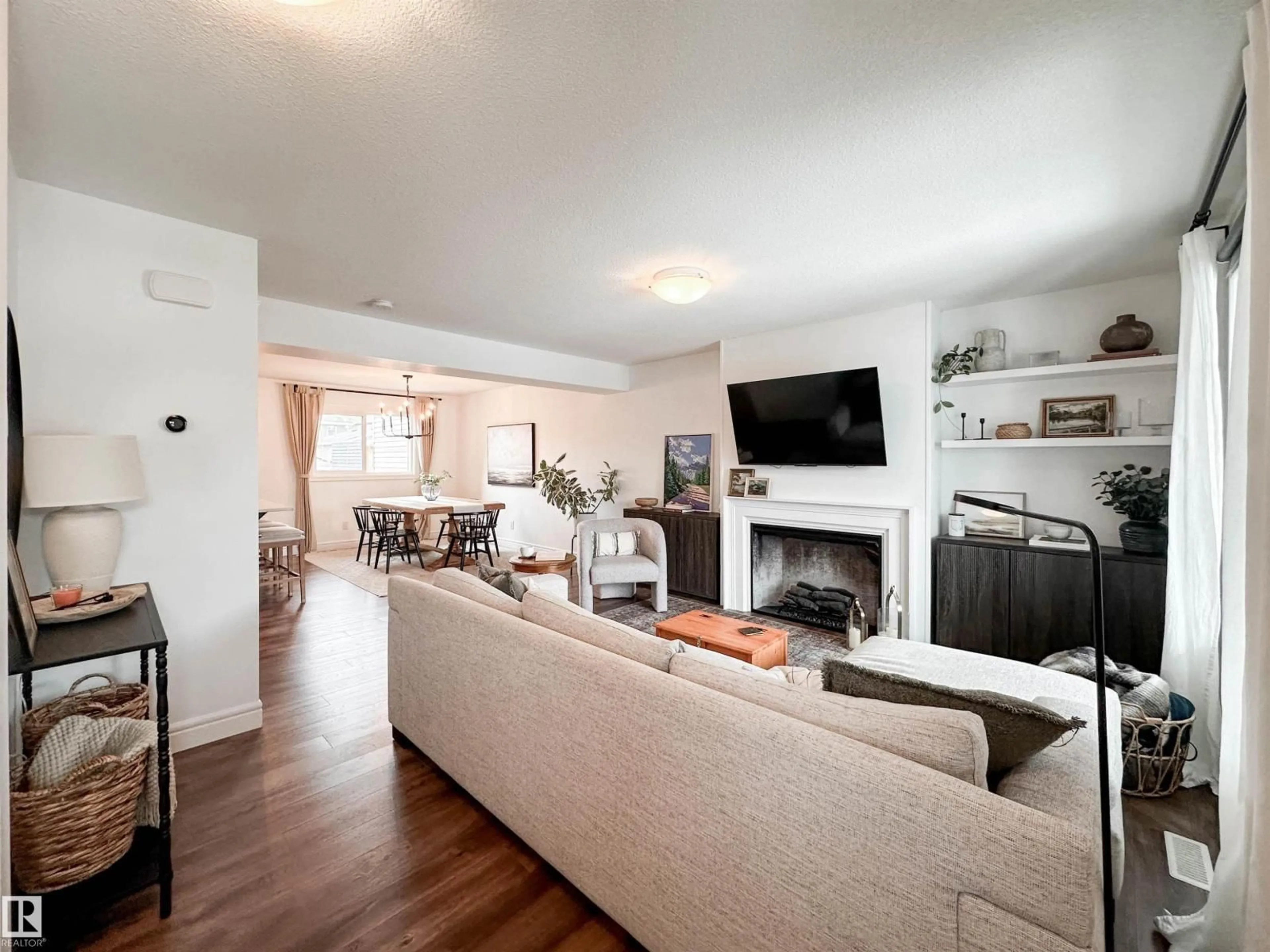 Living room with furniture, unknown for 6860 EVANS WD, Edmonton Alberta T6M0T6