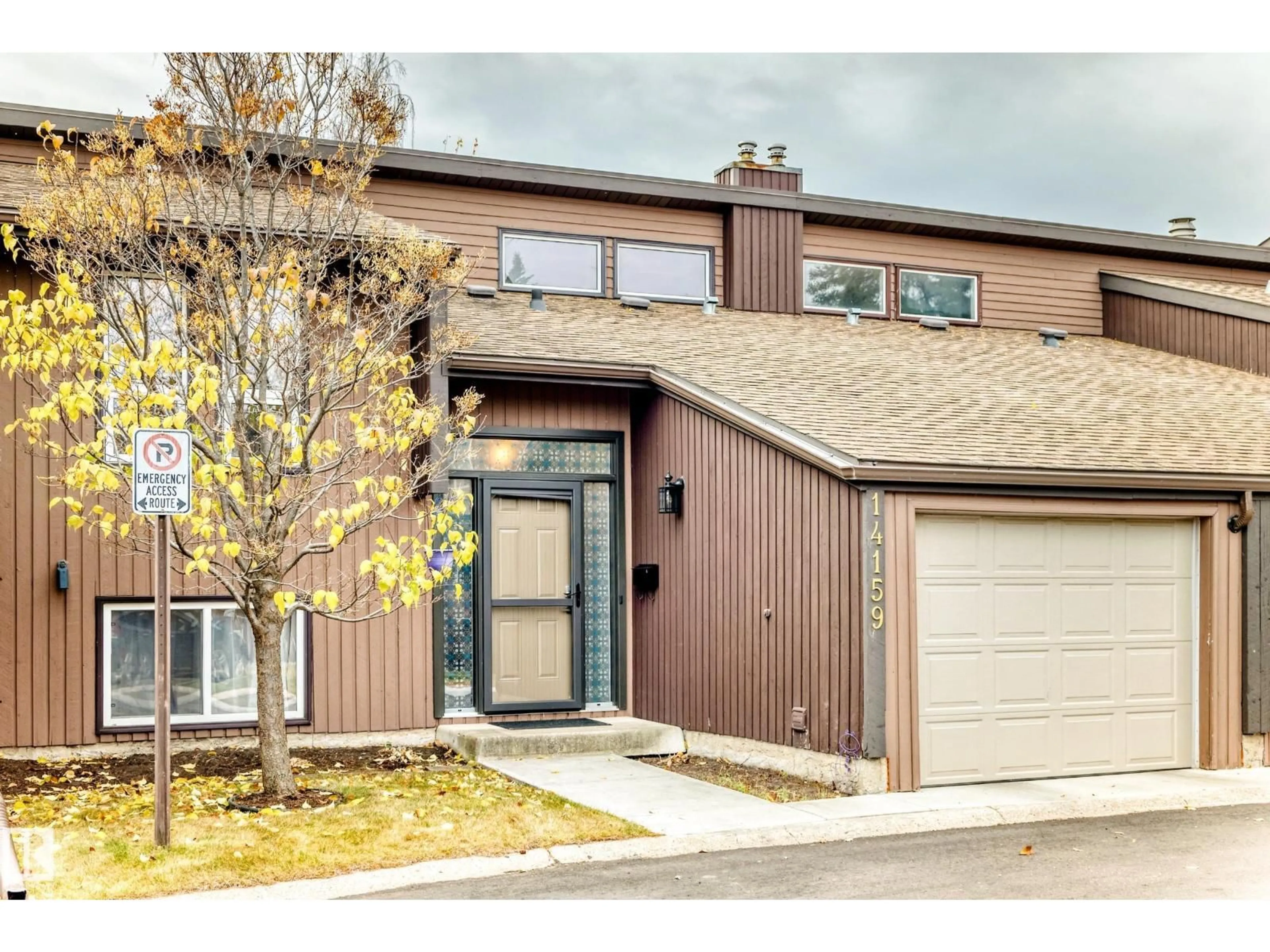 Home with brick exterior material, street for 14159 26 ST, Edmonton Alberta T5Y1S2