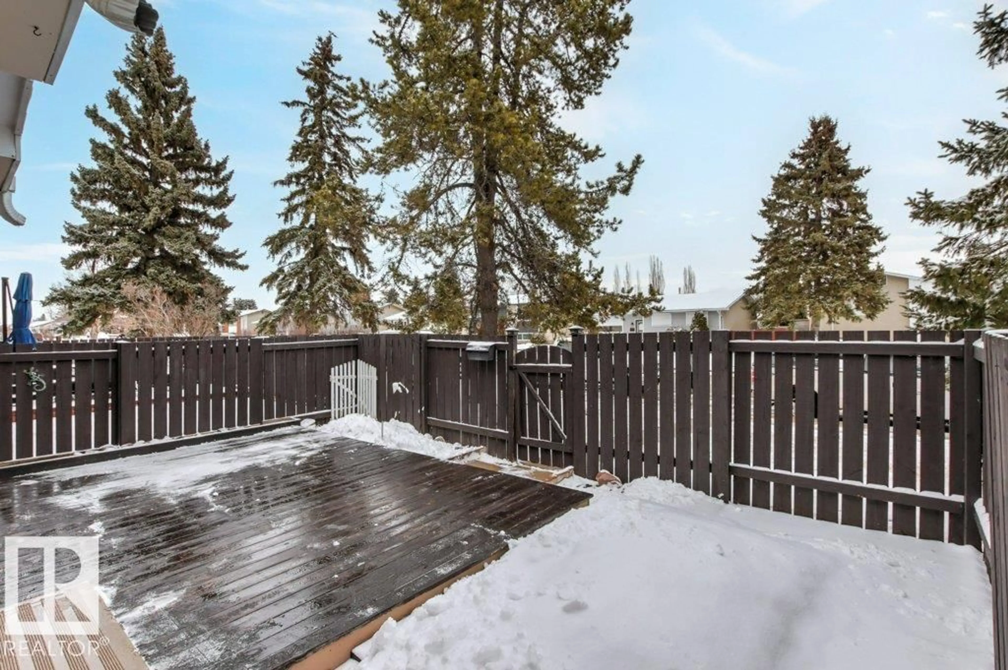 Patio, forest/trees view for NW - 124 ROSELAND VG, Edmonton Alberta T5E5R6