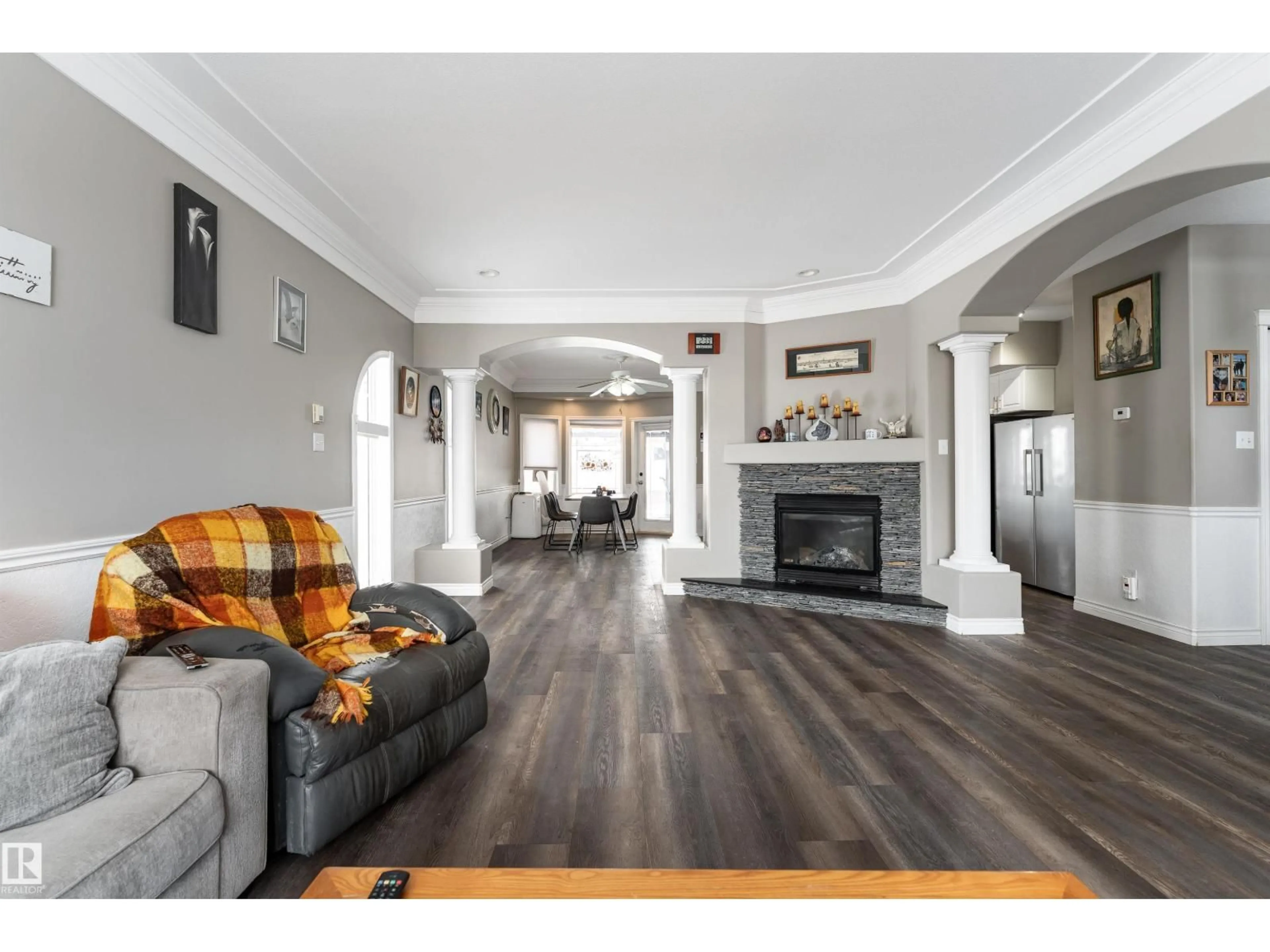 Living room with furniture, wood/laminate floor for 4403 YEOMAN DR, Onoway Alberta T0E1V0