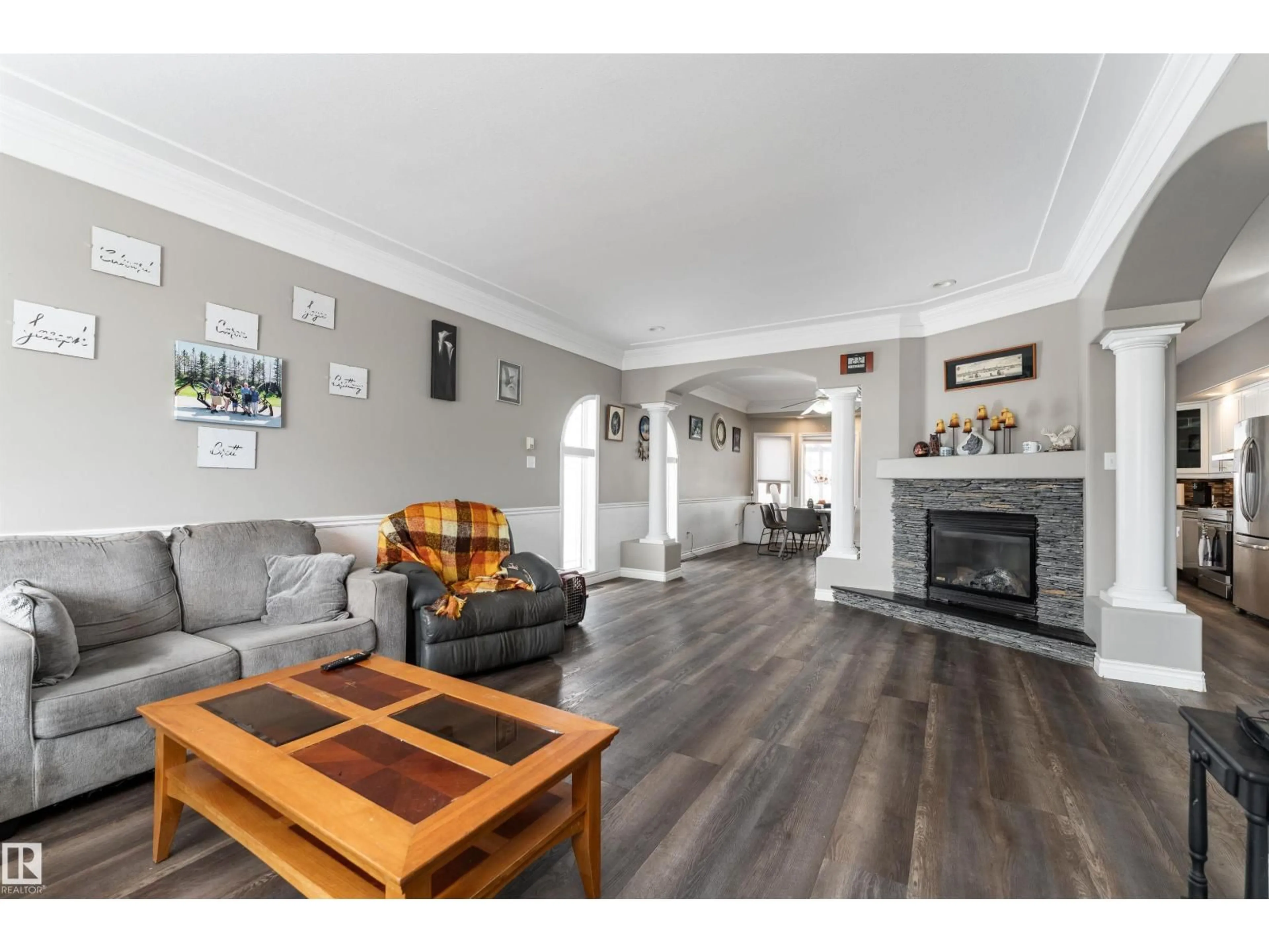 Living room with furniture, wood/laminate floor for 4403 YEOMAN DR, Onoway Alberta T0E1V0