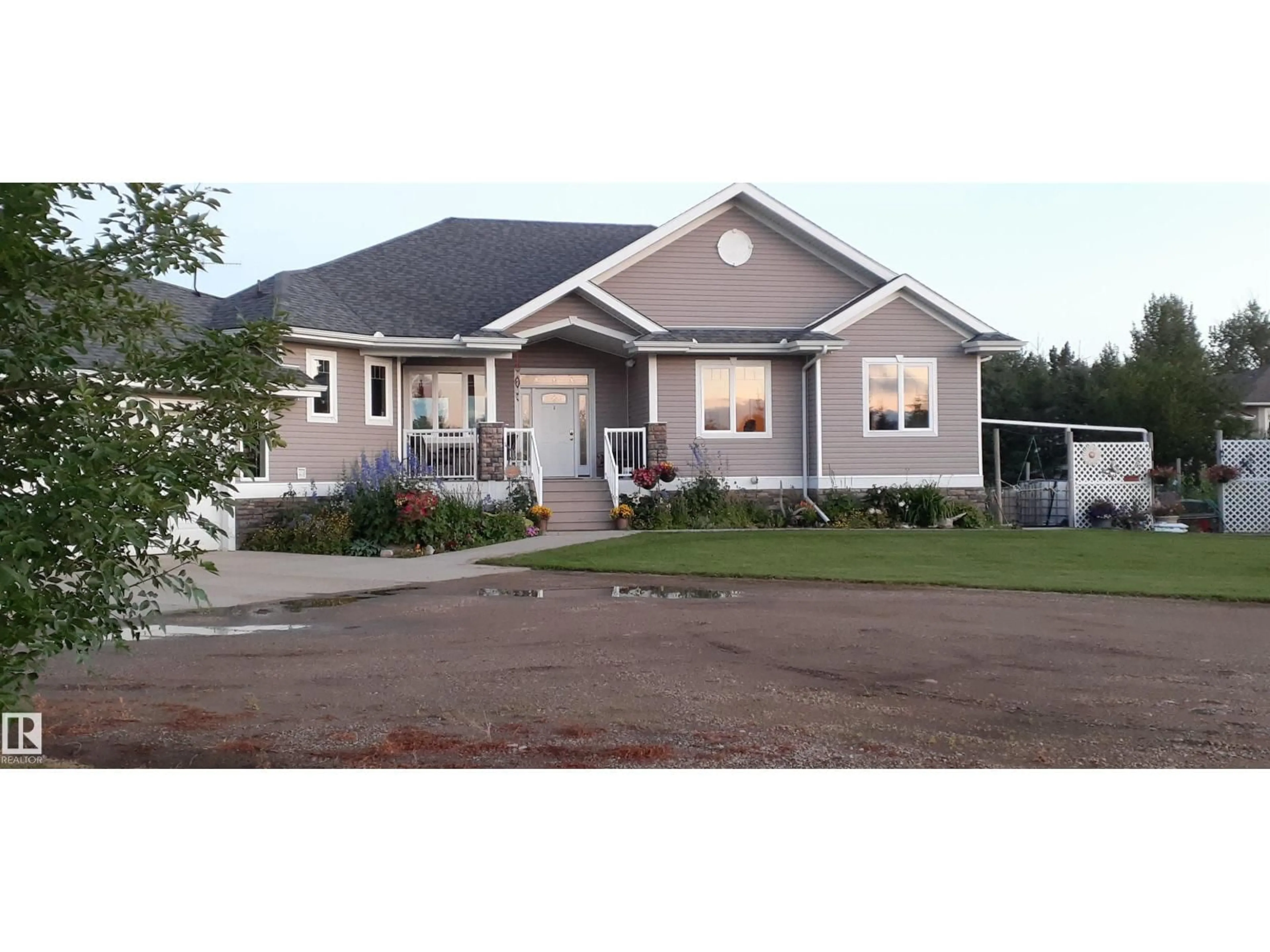 Home with vinyl exterior material, street for 53522 - 5 RGE ROAD 272, Rural Parkland County Alberta T7X3N2