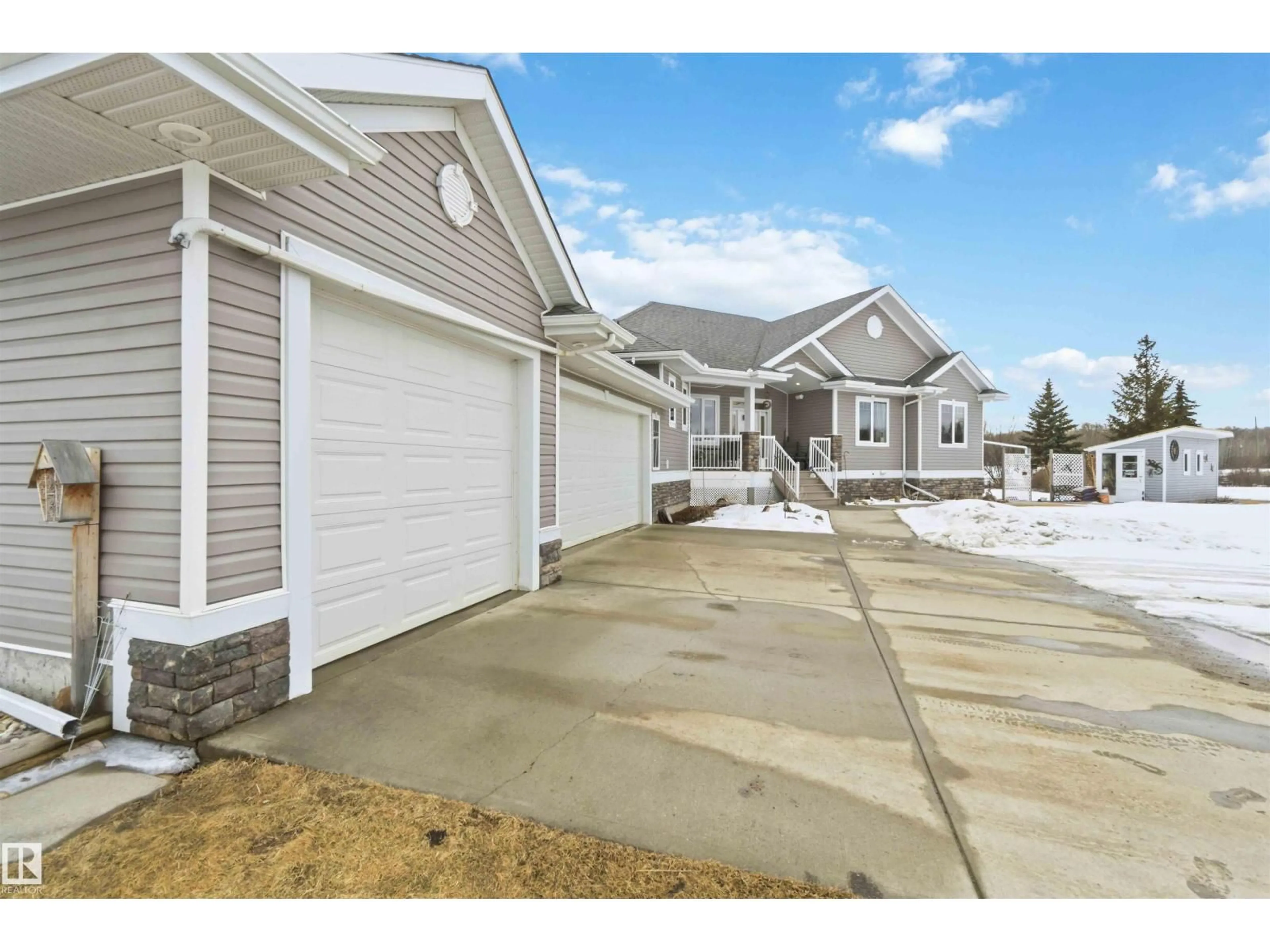 Home with vinyl exterior material, street for 53522 - 5 RGE ROAD 272, Rural Parkland County Alberta T7X3N2