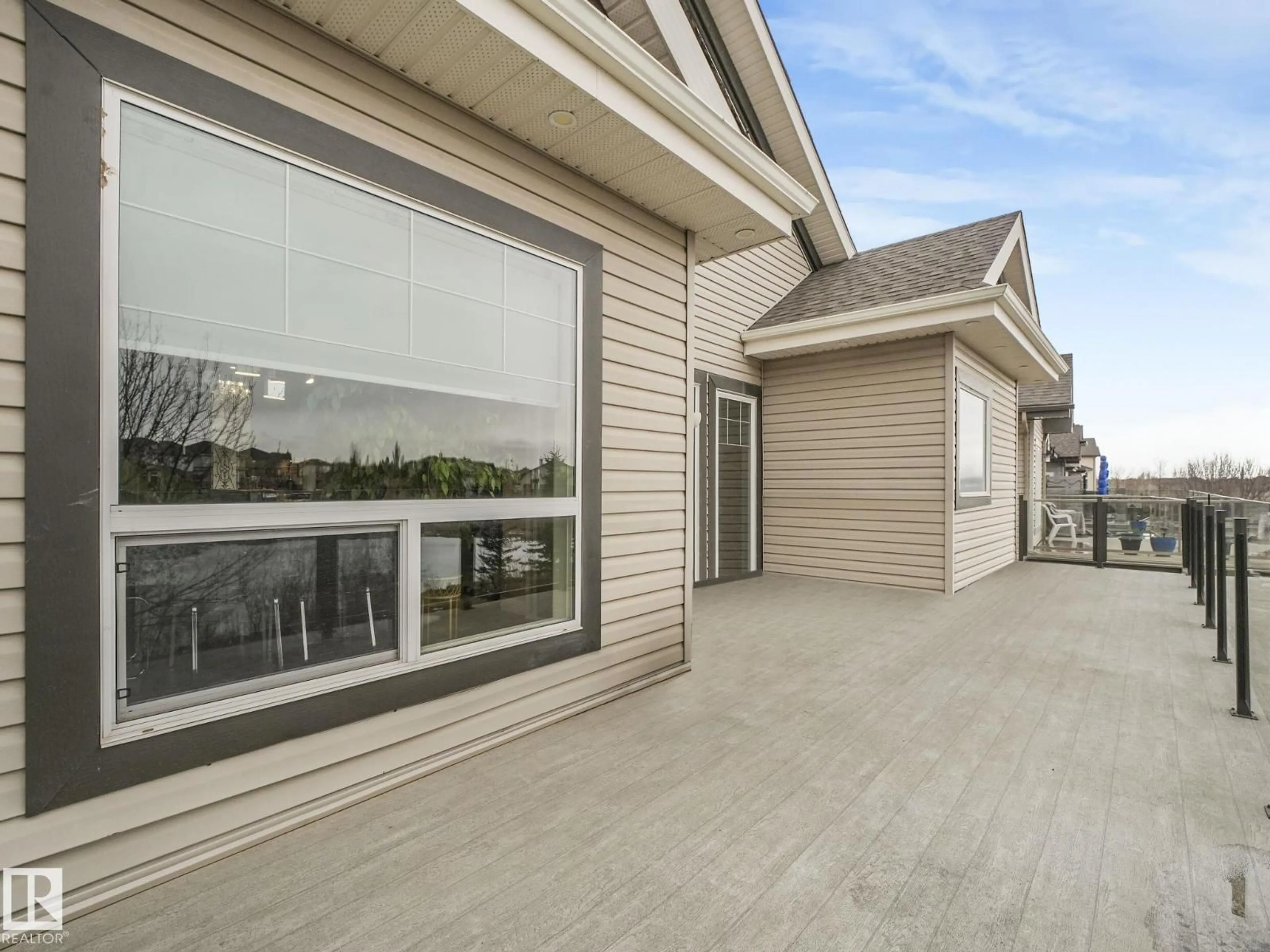 Home with vinyl exterior material, street for 876 HODGINS RD, Edmonton Alberta T6M0K8