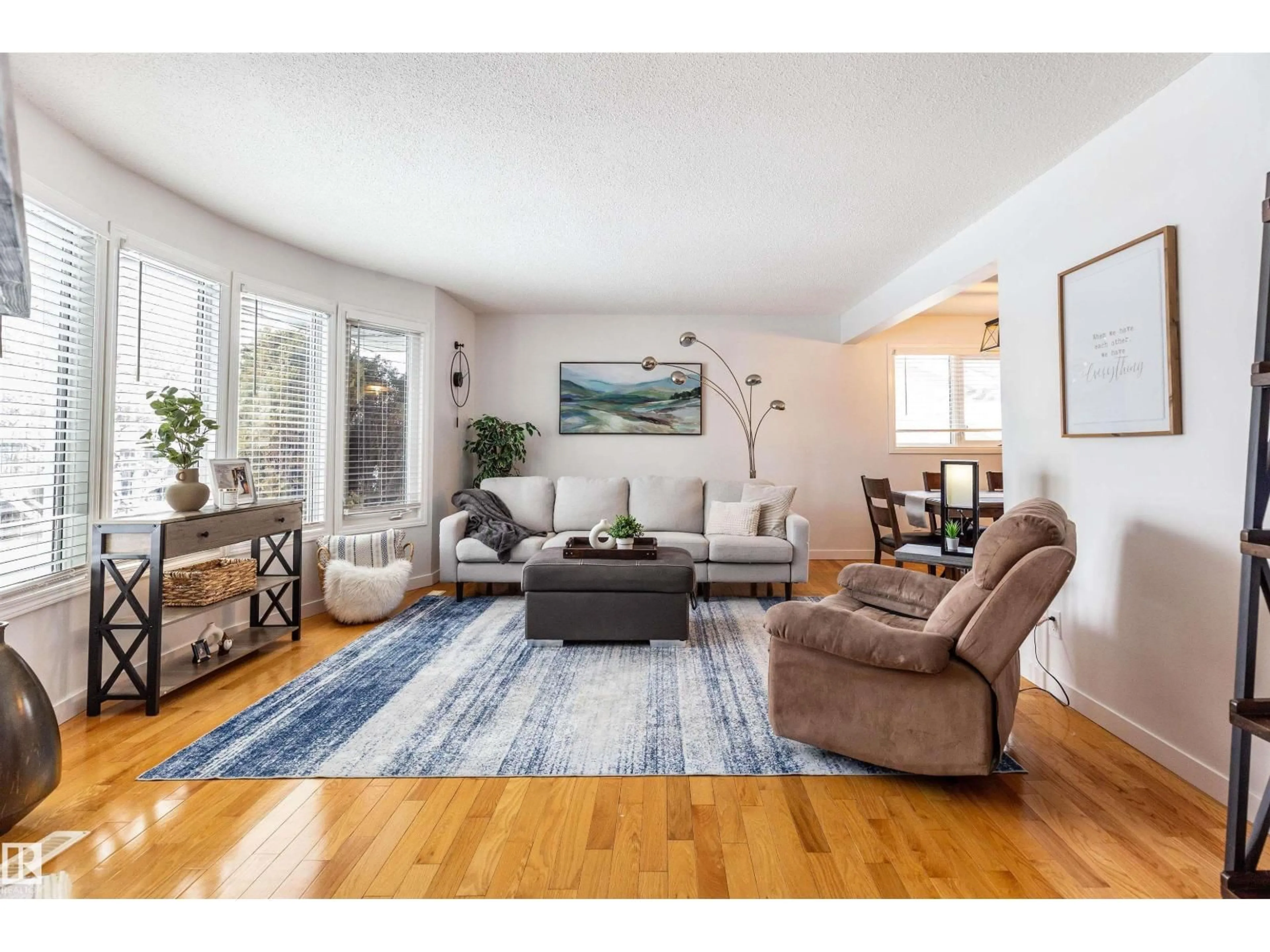 Living room with furniture, wood/laminate floor for 30 GROVELAND RD, Sherwood Park Alberta T8A3G6