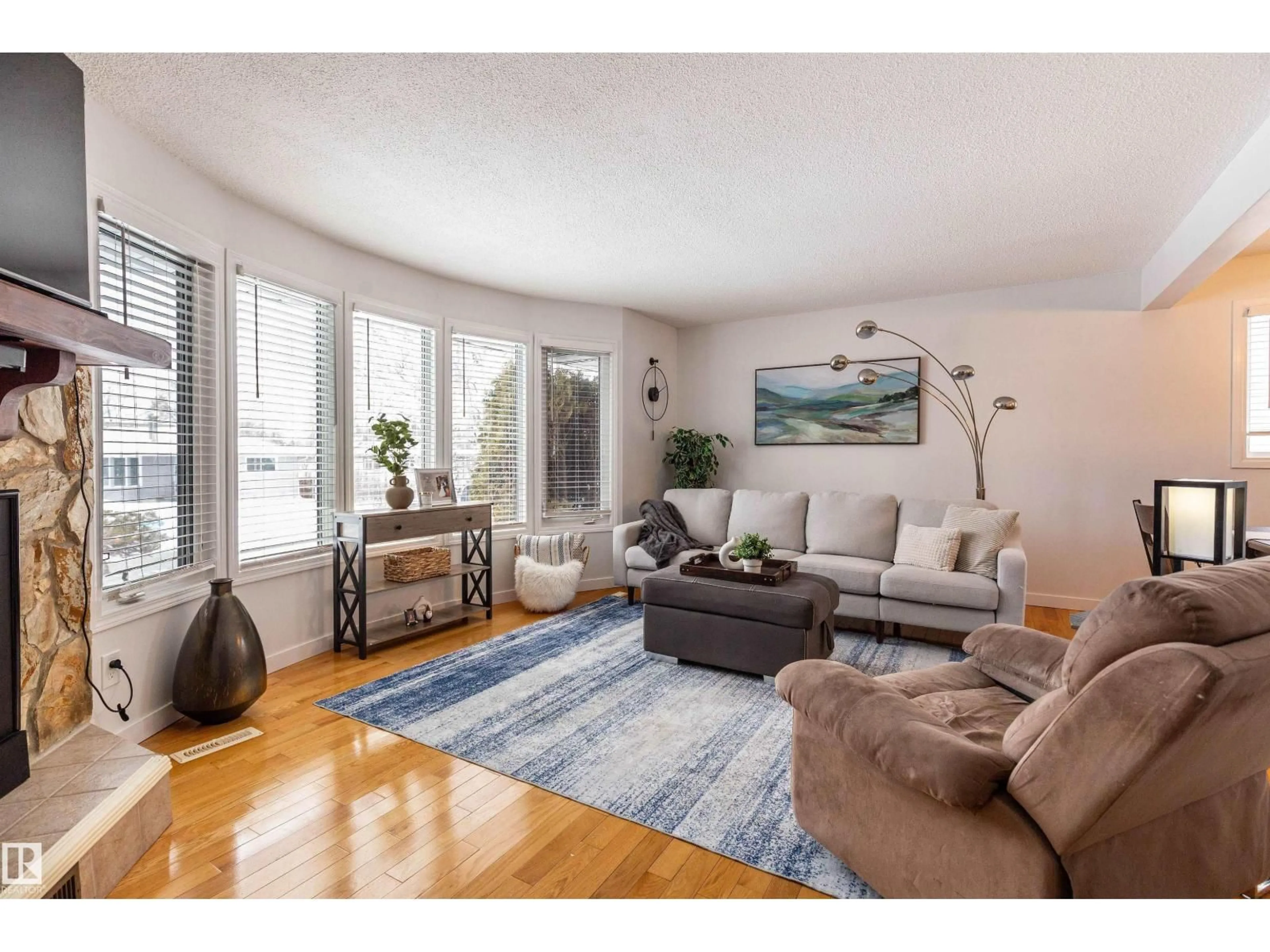 Living room with furniture, wood/laminate floor for 30 GROVELAND RD, Sherwood Park Alberta T8A3G6