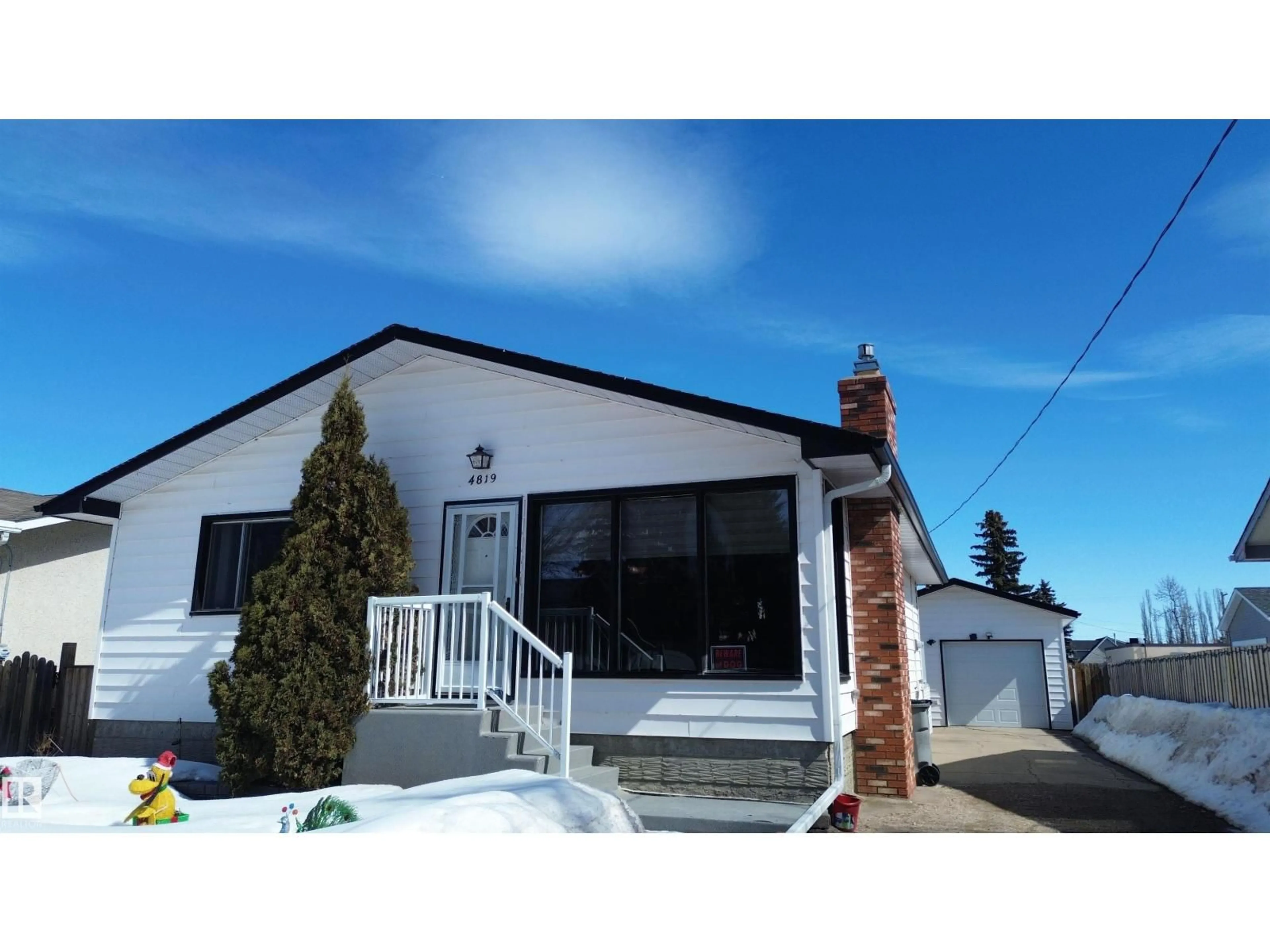 Home with vinyl exterior material, street for 4819 51 ST, Legal Alberta T0G1L0