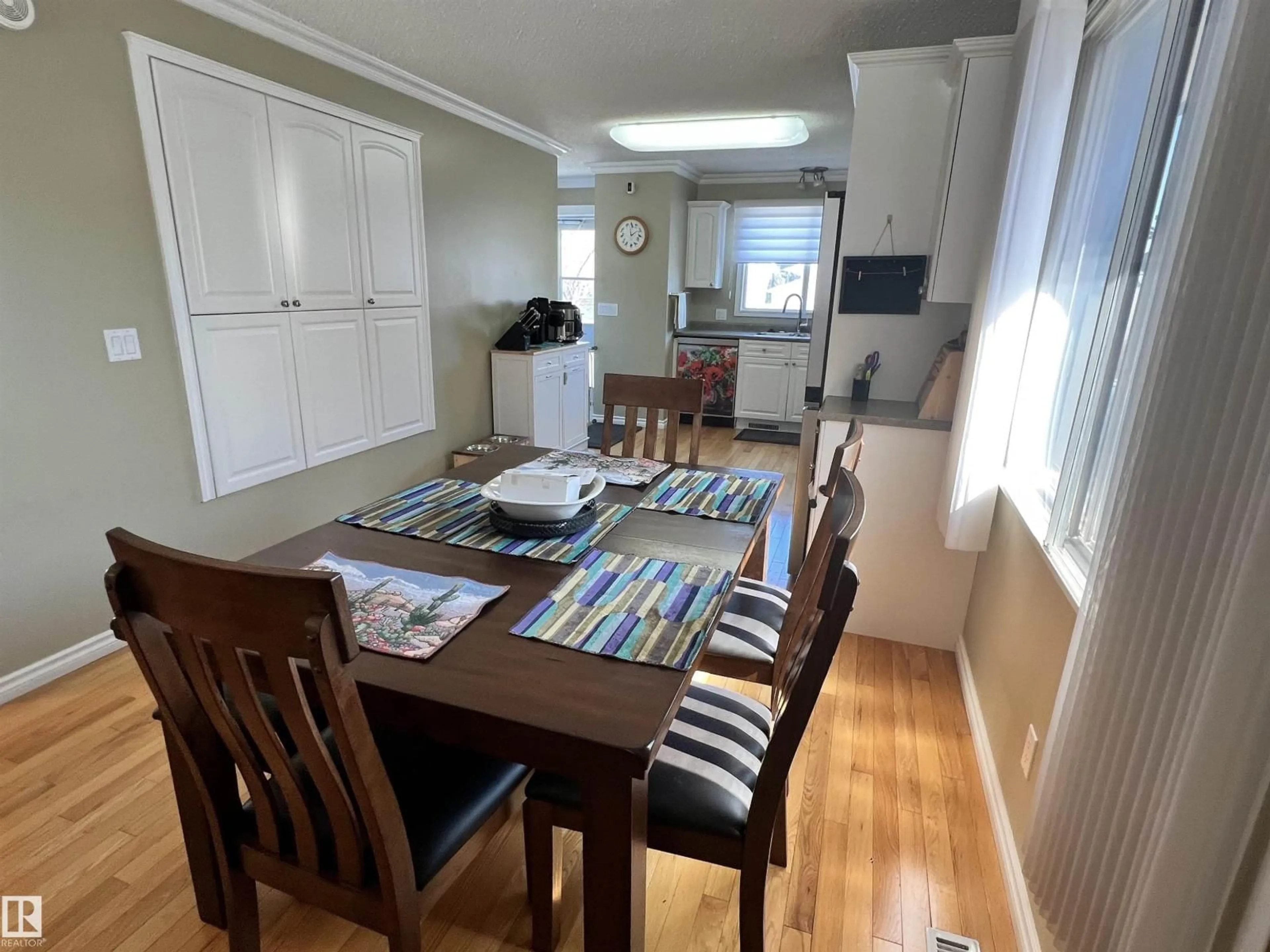 Dining room, wood/laminate floor for 4819 51 ST, Legal Alberta T0G1L0