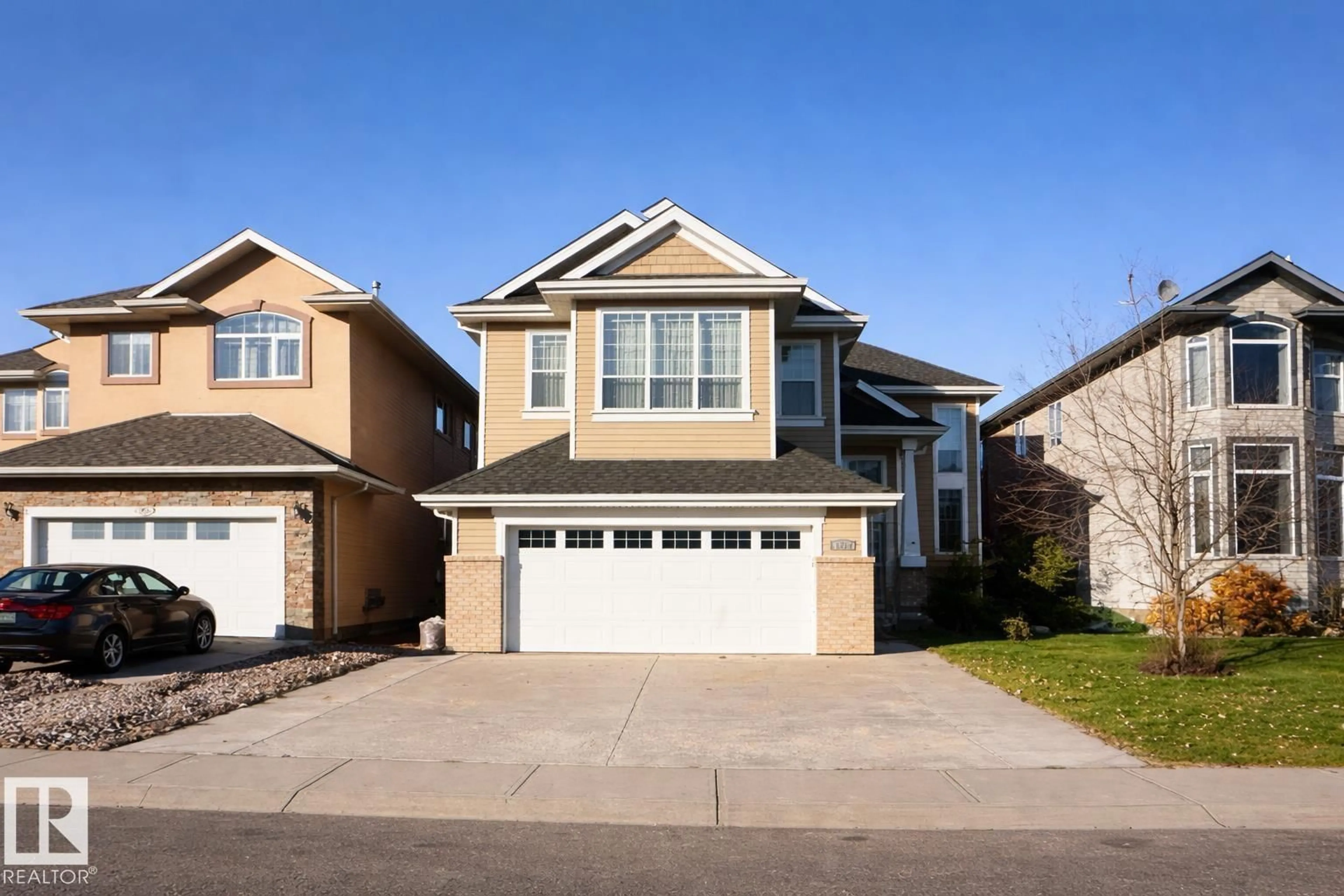 Home with vinyl exterior material, street for 6712 18 AVE SW, Edmonton Alberta T6X0G9