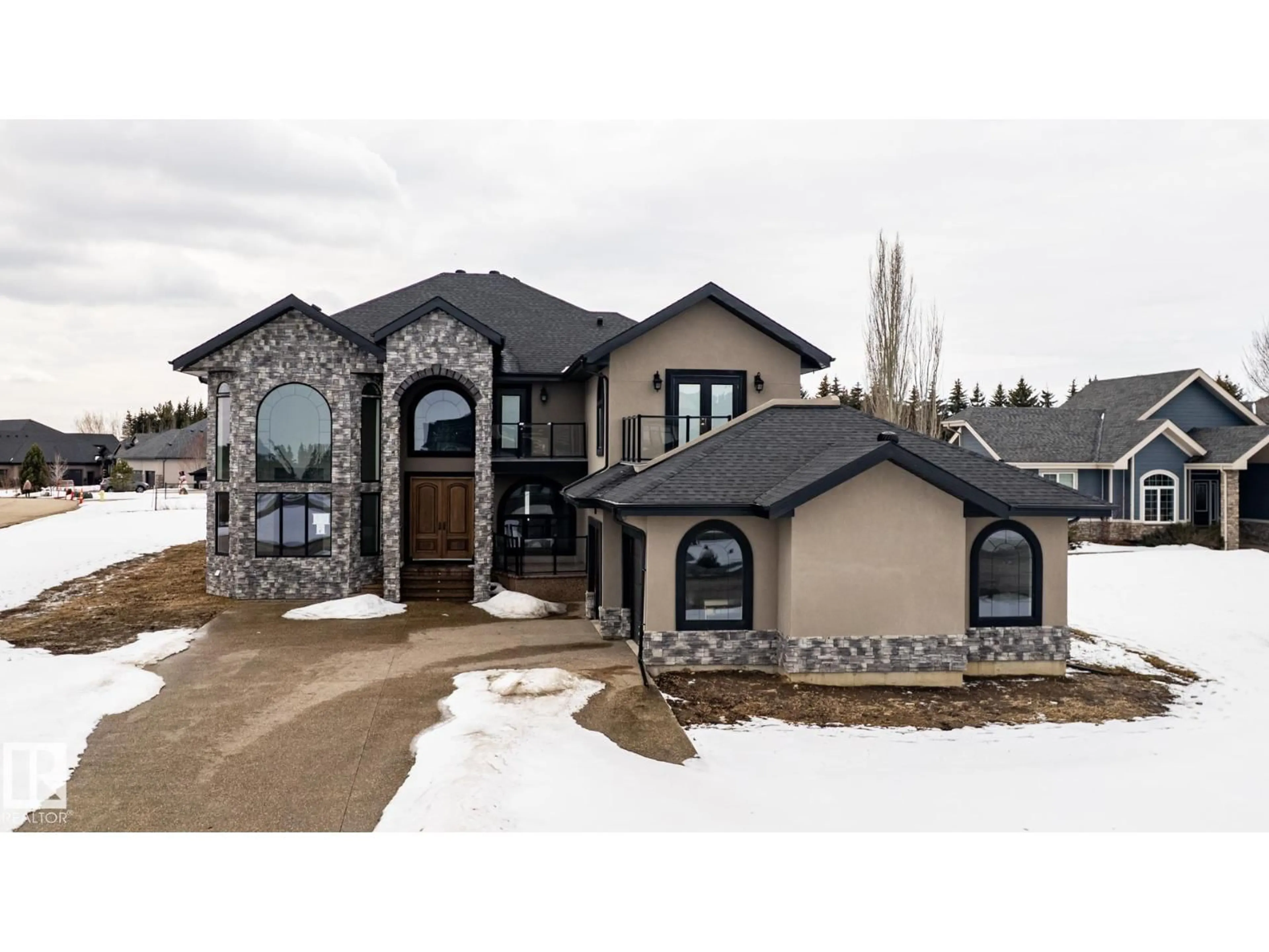 Home with brick exterior material, mountain view for 229 54302 RGE ROAD 250, Rural Sturgeon County Alberta T8T0C9