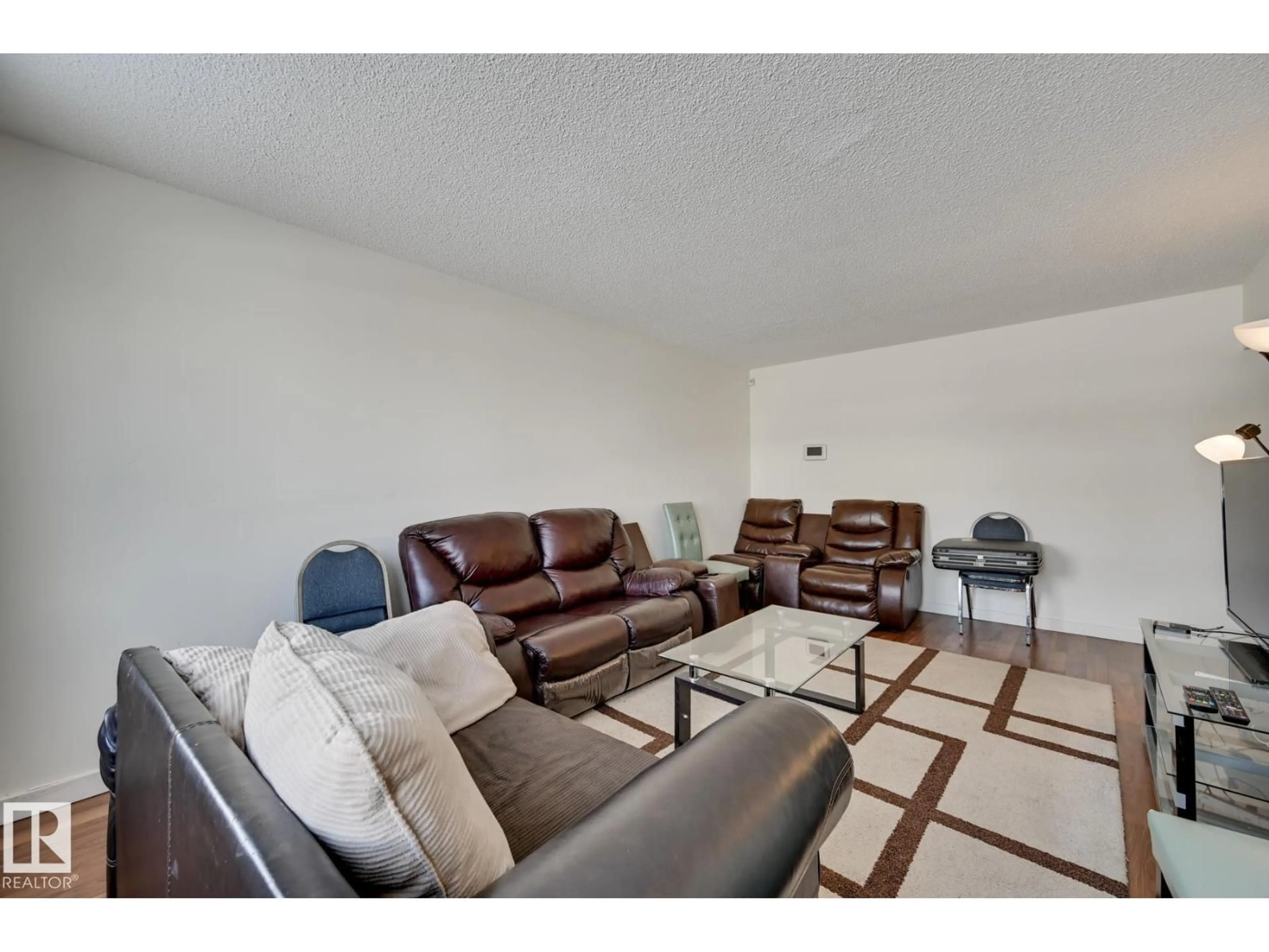 Living room with furniture, unknown for 6621 132 AV, Edmonton Alberta T5C2A4