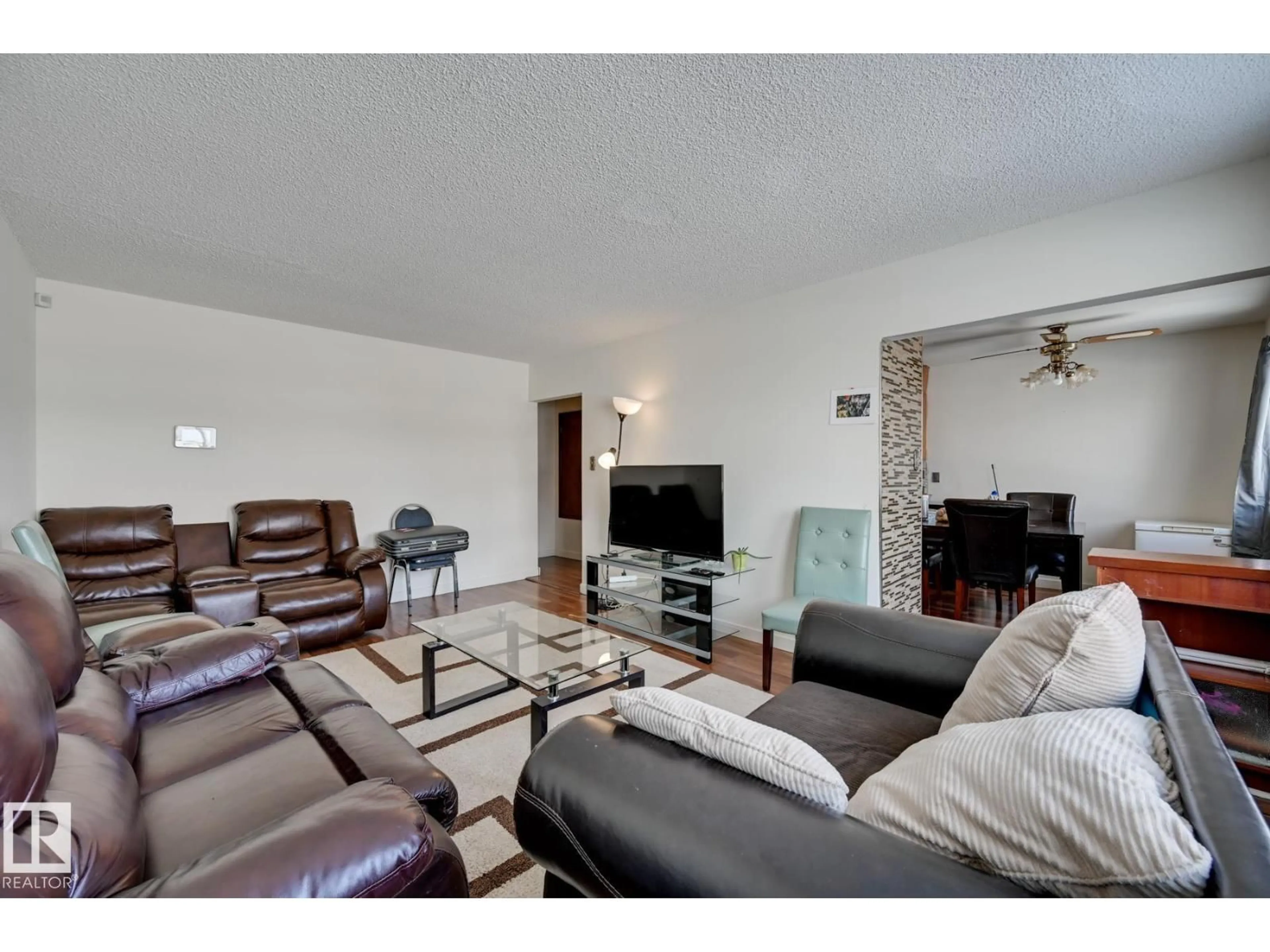 Living room with furniture, unknown for 6621 132 AV, Edmonton Alberta T5C2A4