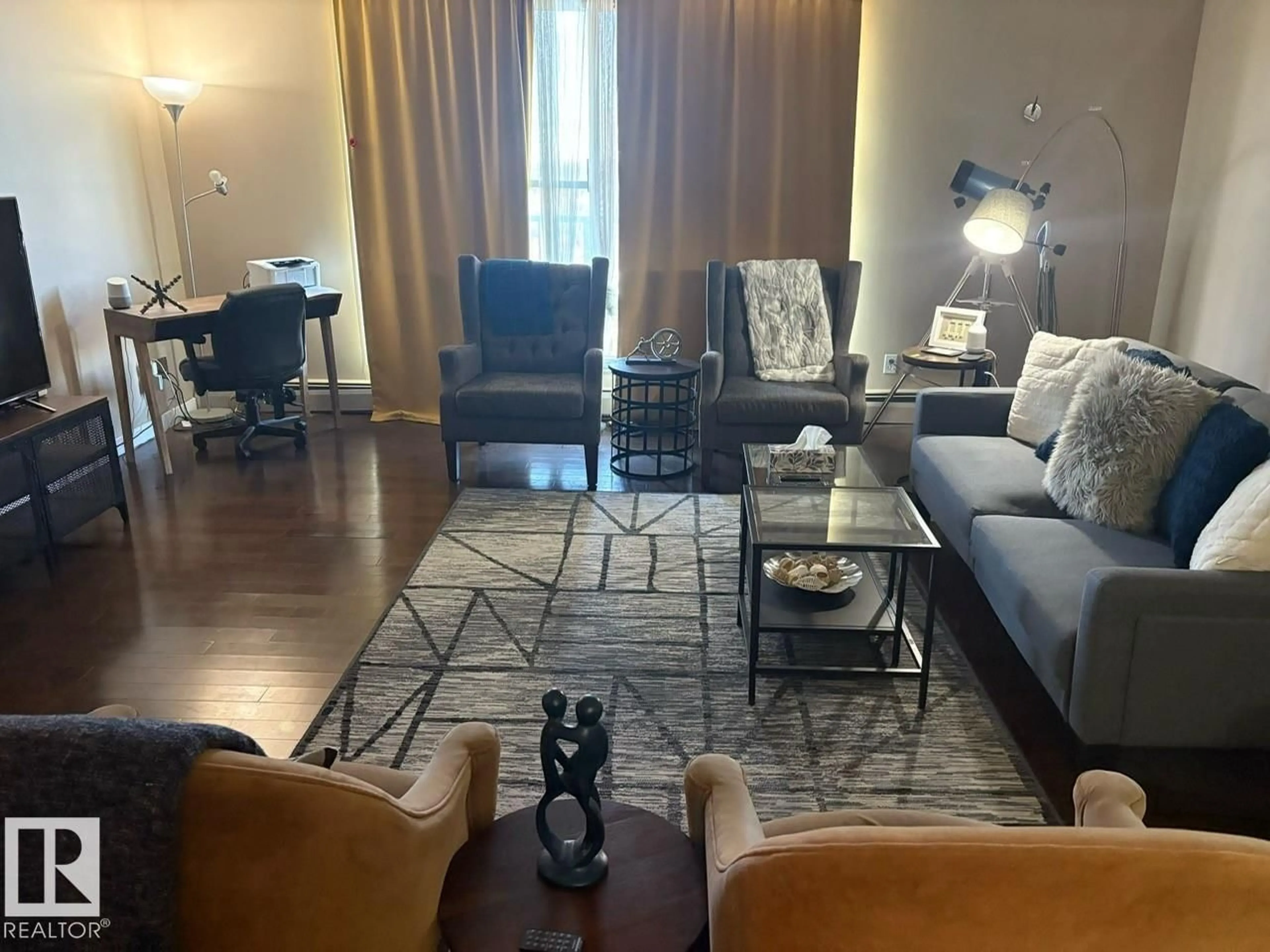 Living room with furniture, unknown for 1406 - 12141 JASPER AV, Edmonton Alberta T5N3X8