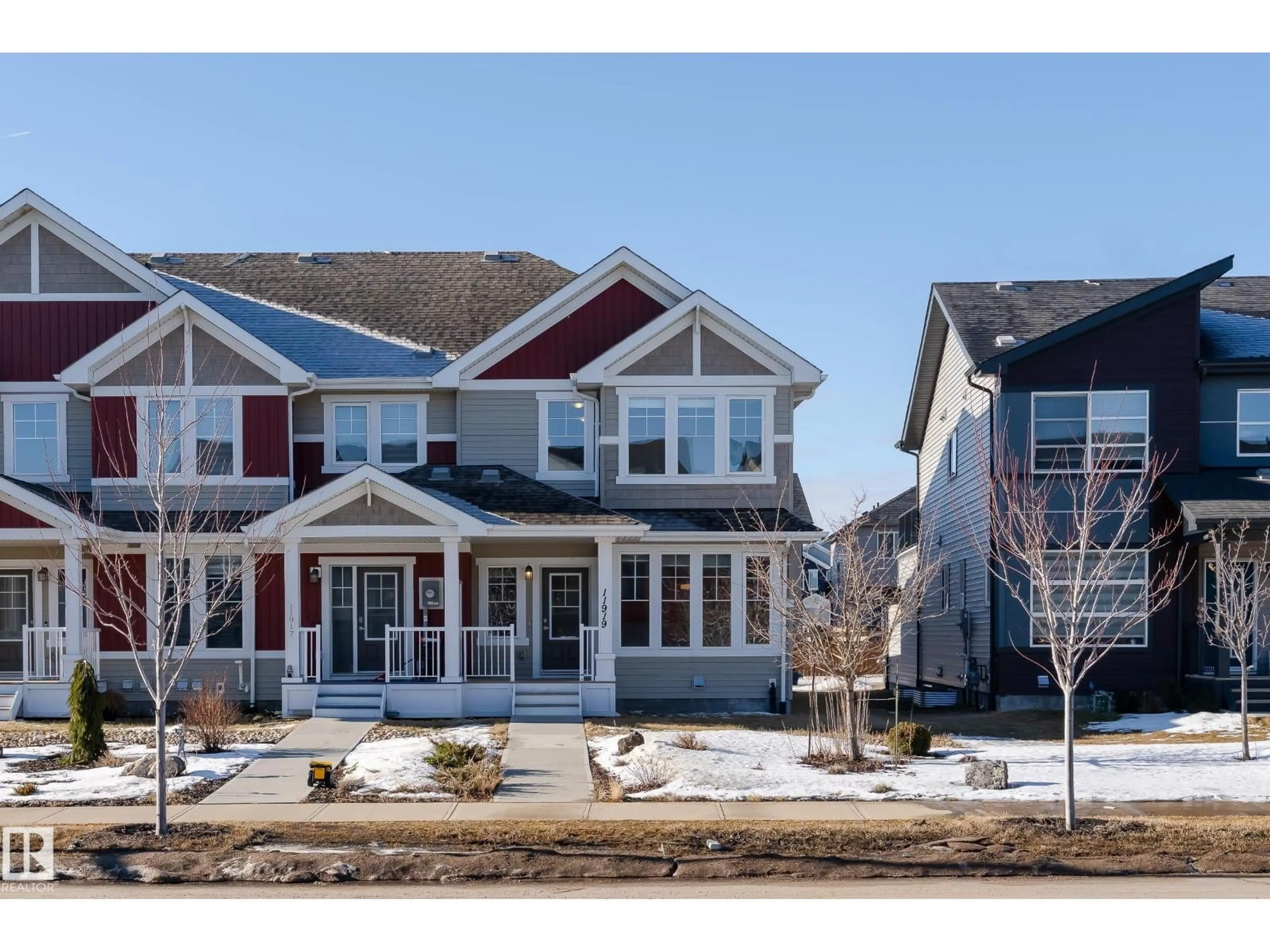 Home with vinyl exterior material, street for 11919 35 AV, Edmonton Alberta T6W4N3