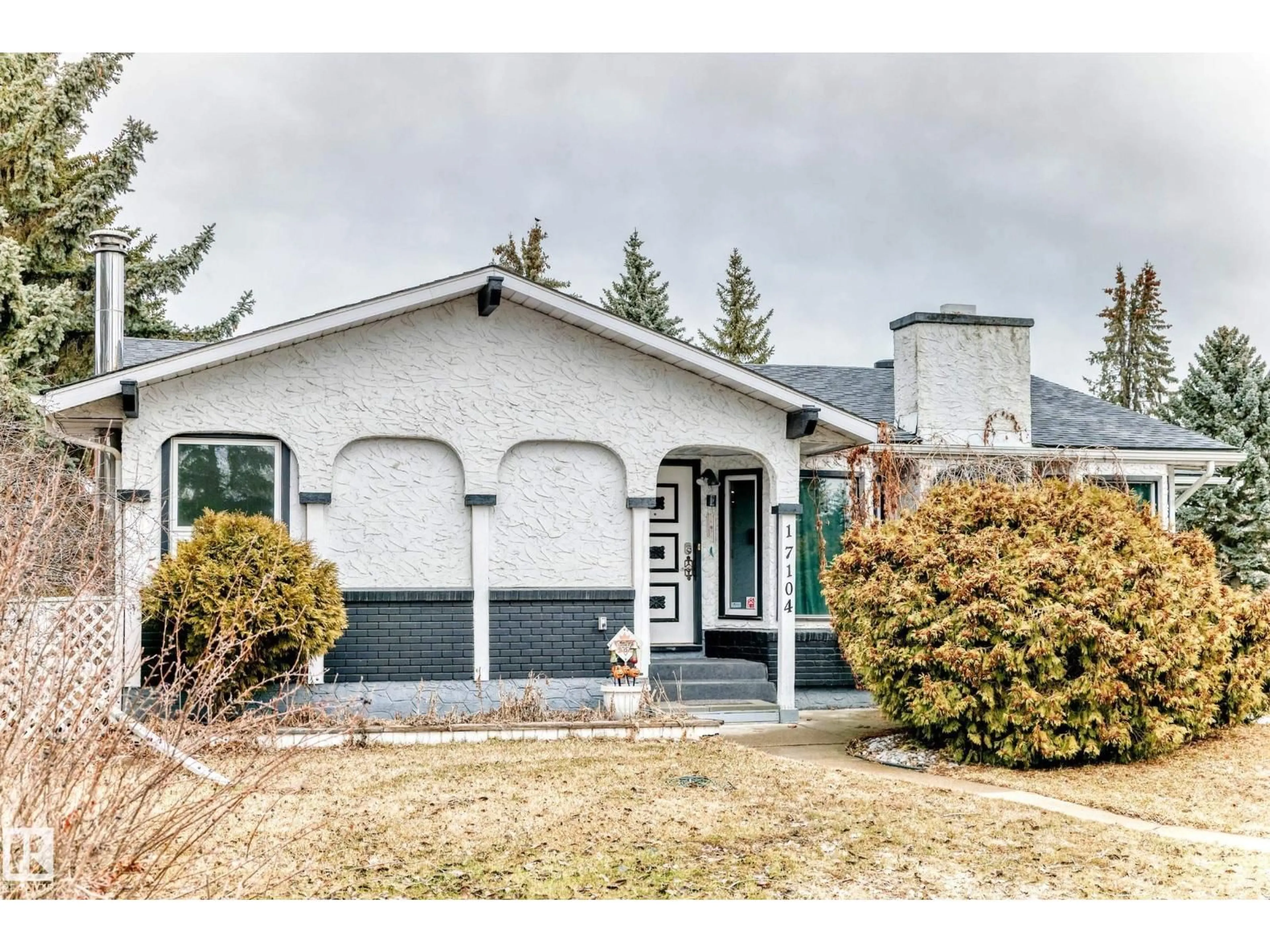 Home with vinyl exterior material, street for 17104 85 AV, Edmonton Alberta T5T0K8