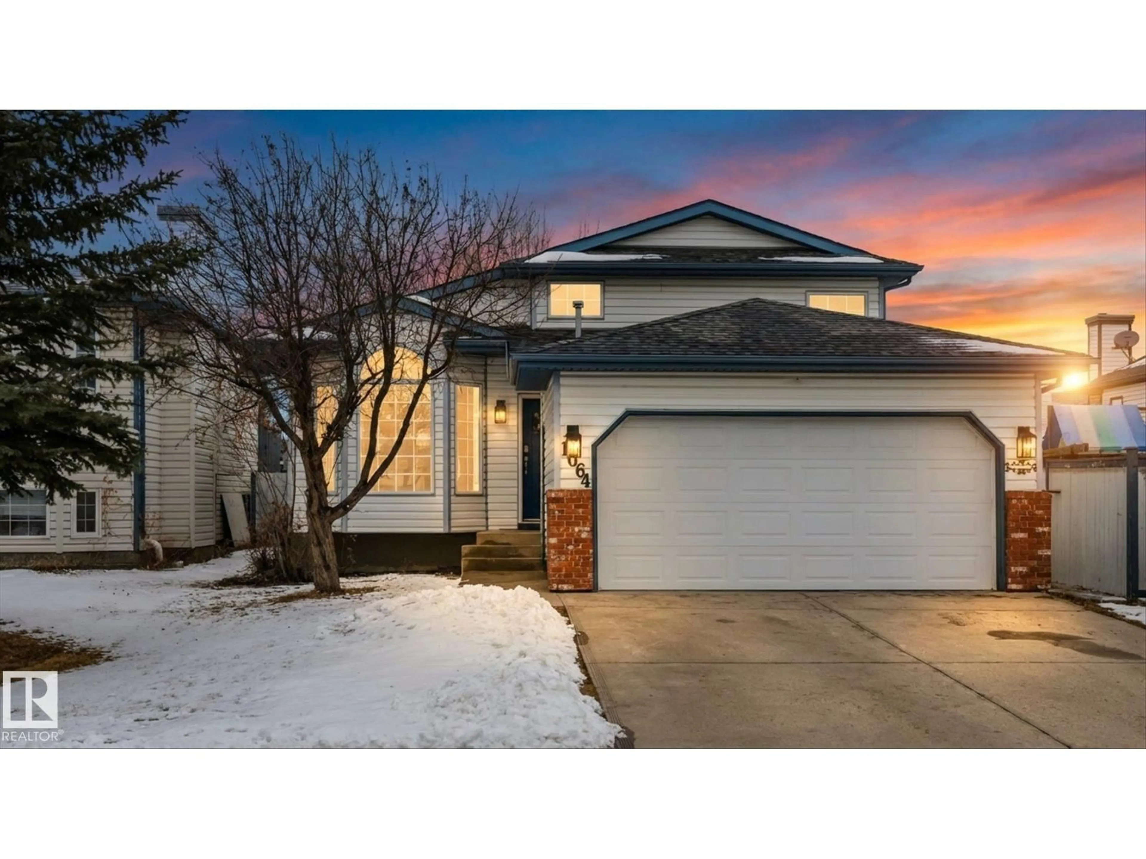 Home with vinyl exterior material, street for 1064 JONES CR, Edmonton Alberta T6L6Y1