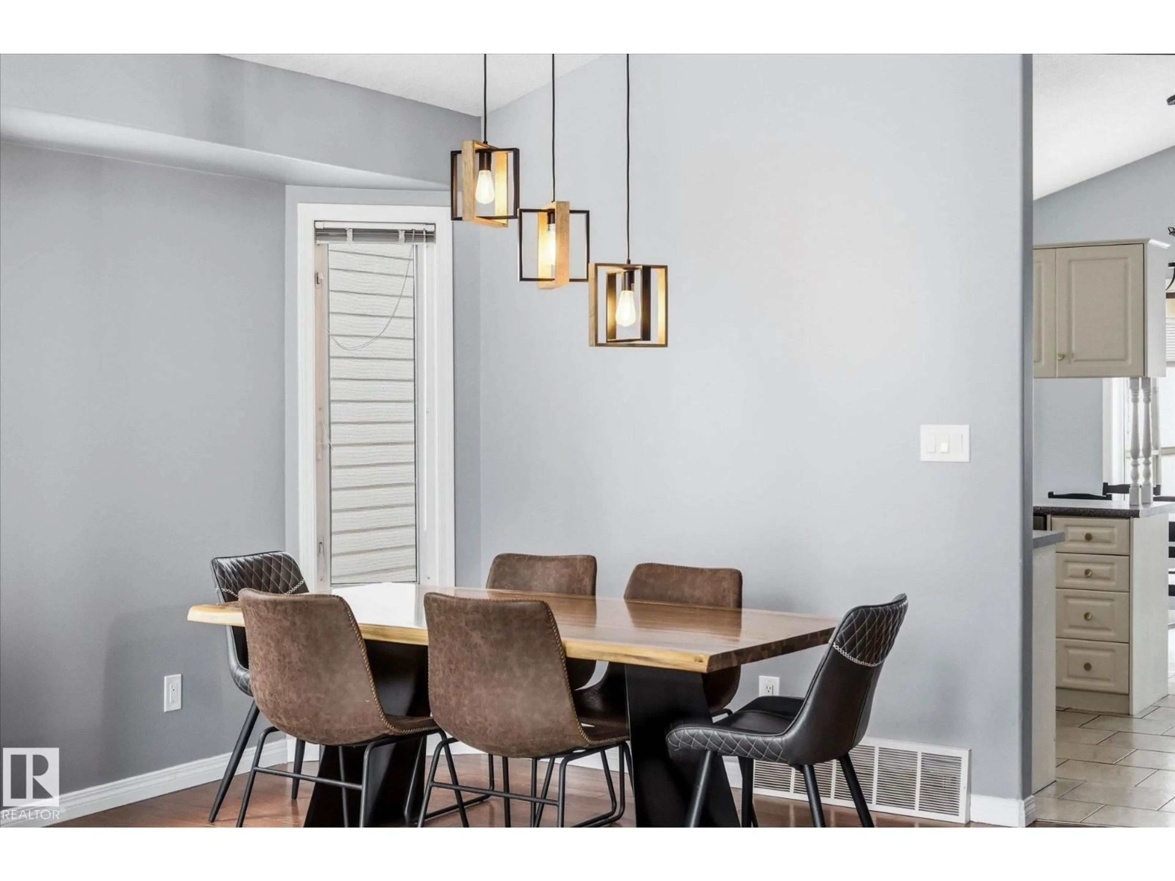 Dining room, wood/laminate floor for 1064 JONES CR, Edmonton Alberta T6L6Y1