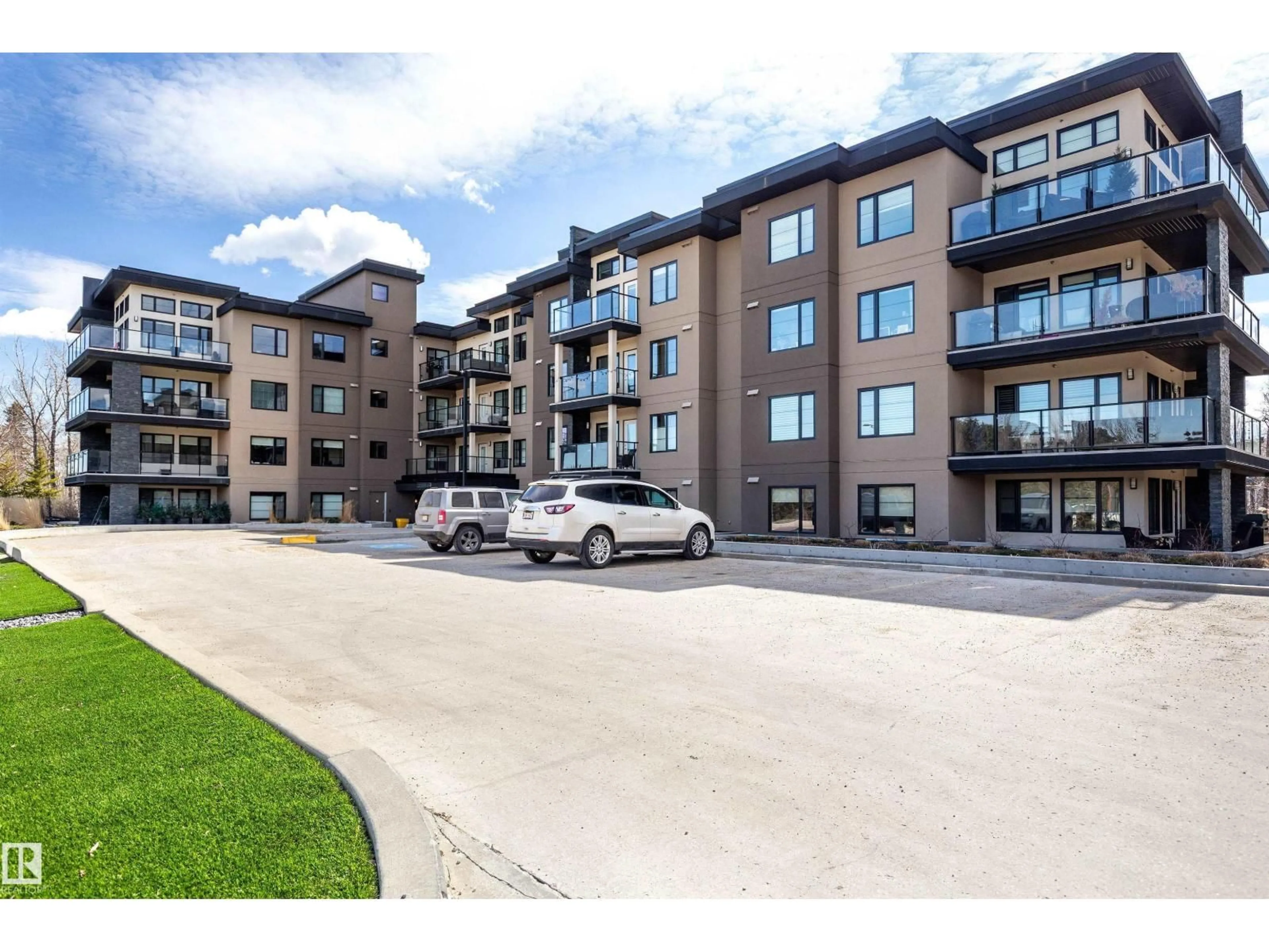 A pic from outside/outdoor area/front of a property/back of a property/a pic from drone, unknown for #108 - 5025 EDGEMONT BV, Edmonton Alberta T6M0S8
